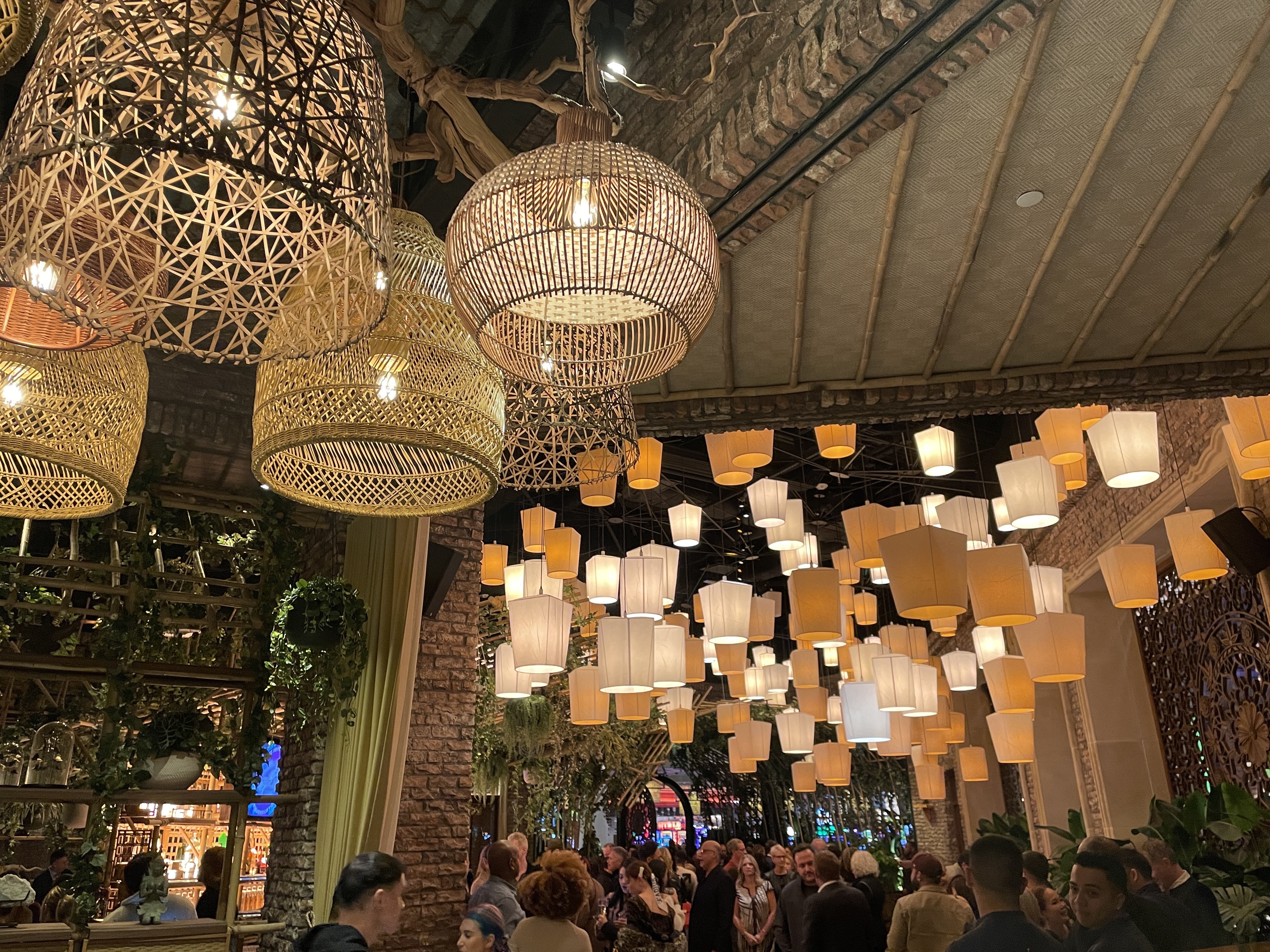 Hundreds of lanterns float above the Lotus of Siam dining room.