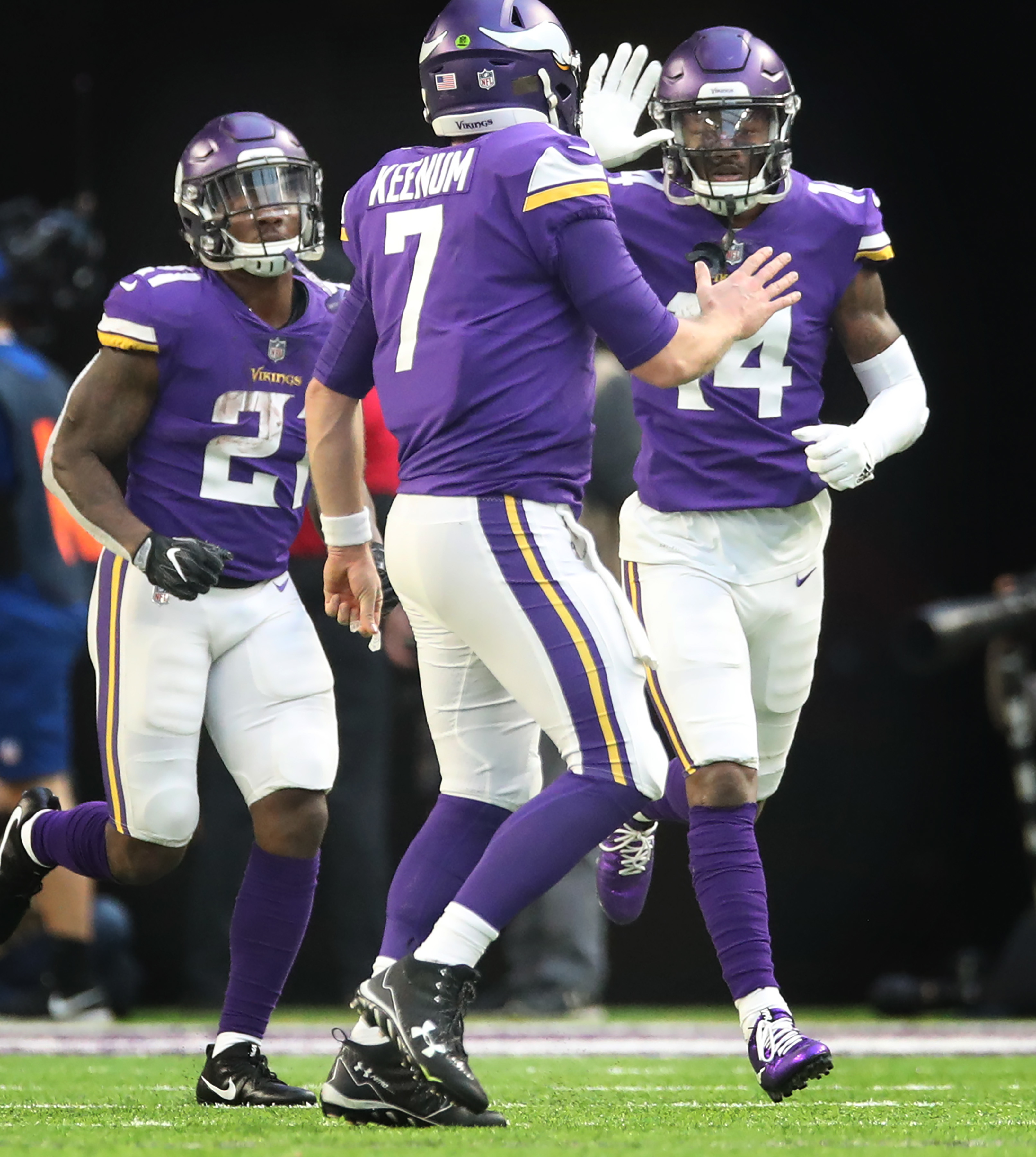 Minnesota Vikings quarterback Case Keenum (7) left celebrated Minnesota Vikings wide receiver Stefon Diggs (14) 15 yard touch down catch in the third quater at U.S. Bank Stadium Sunday December 31, 2017 in Minneapolis, MN.] JERRY HOLT ‚Ä¢ jerry.holt@s