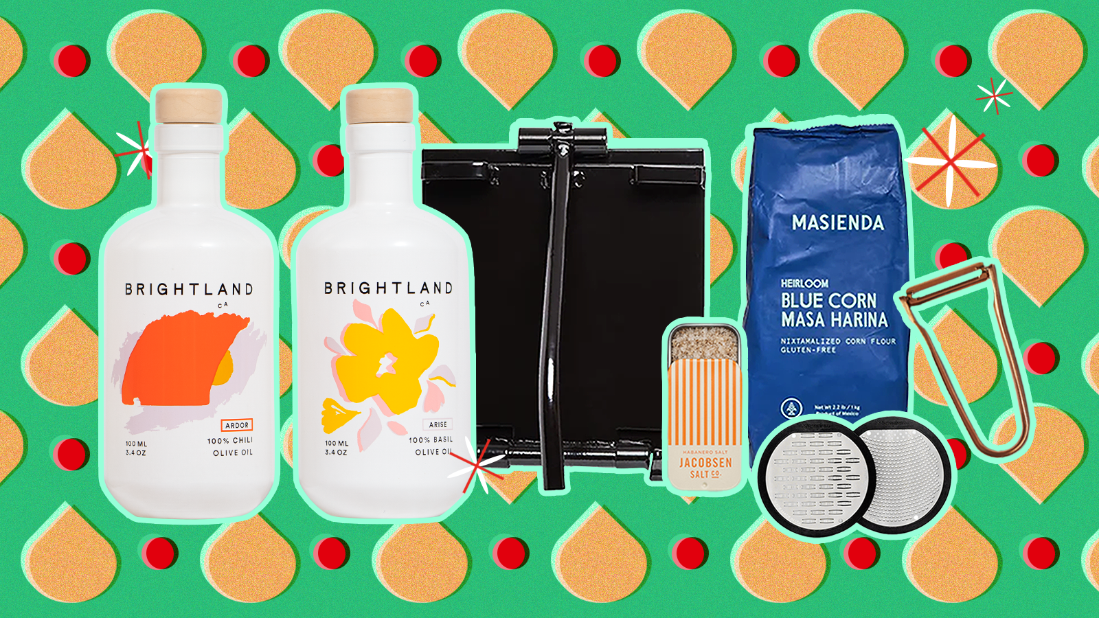 A selection of items on a midcentury-inspired patterned backdrop, including olive oil, a tortilla press, tins of salt, a bag of masa and graters