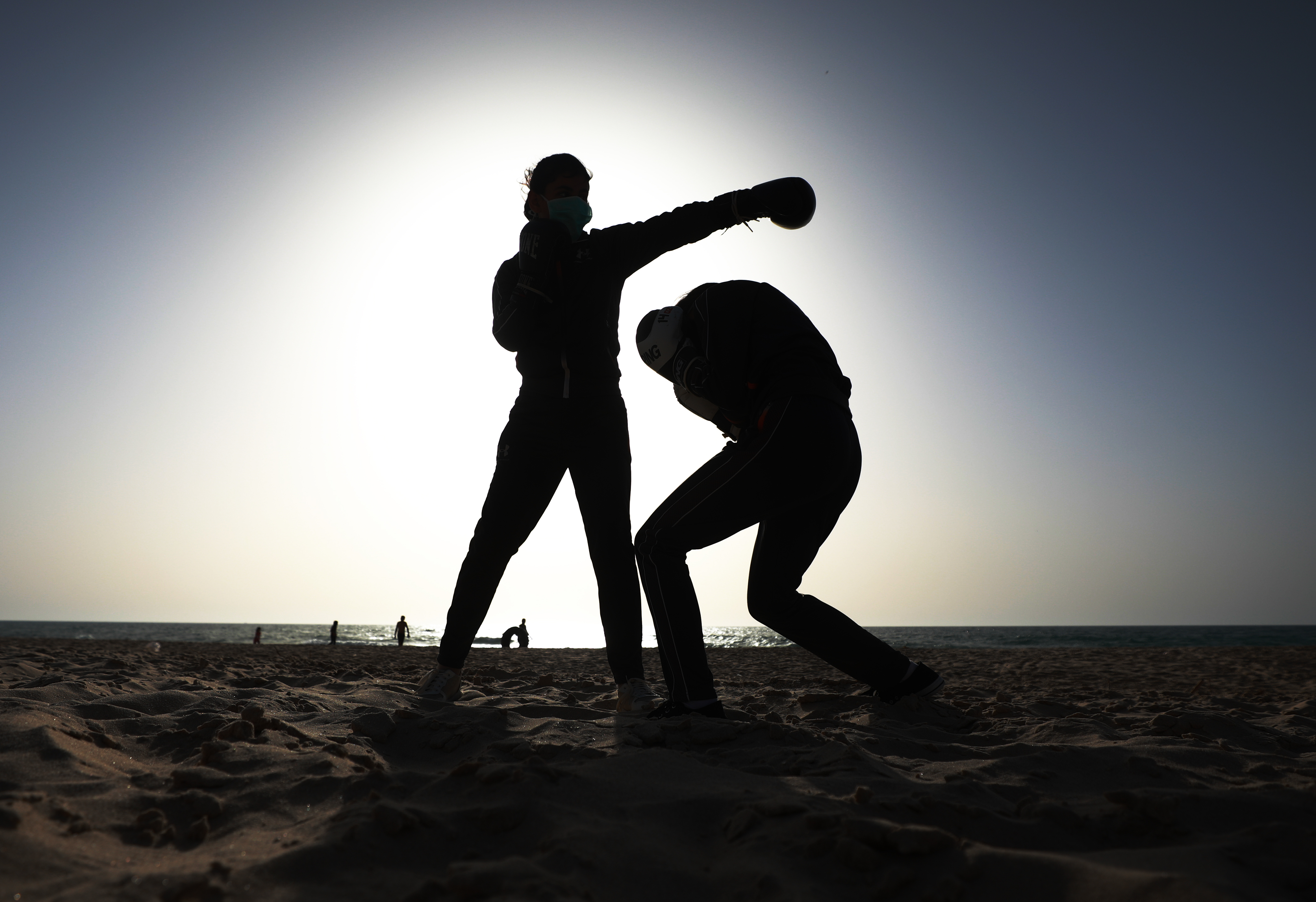 Palestinian boxers train at Gazan beach due to coronavirus