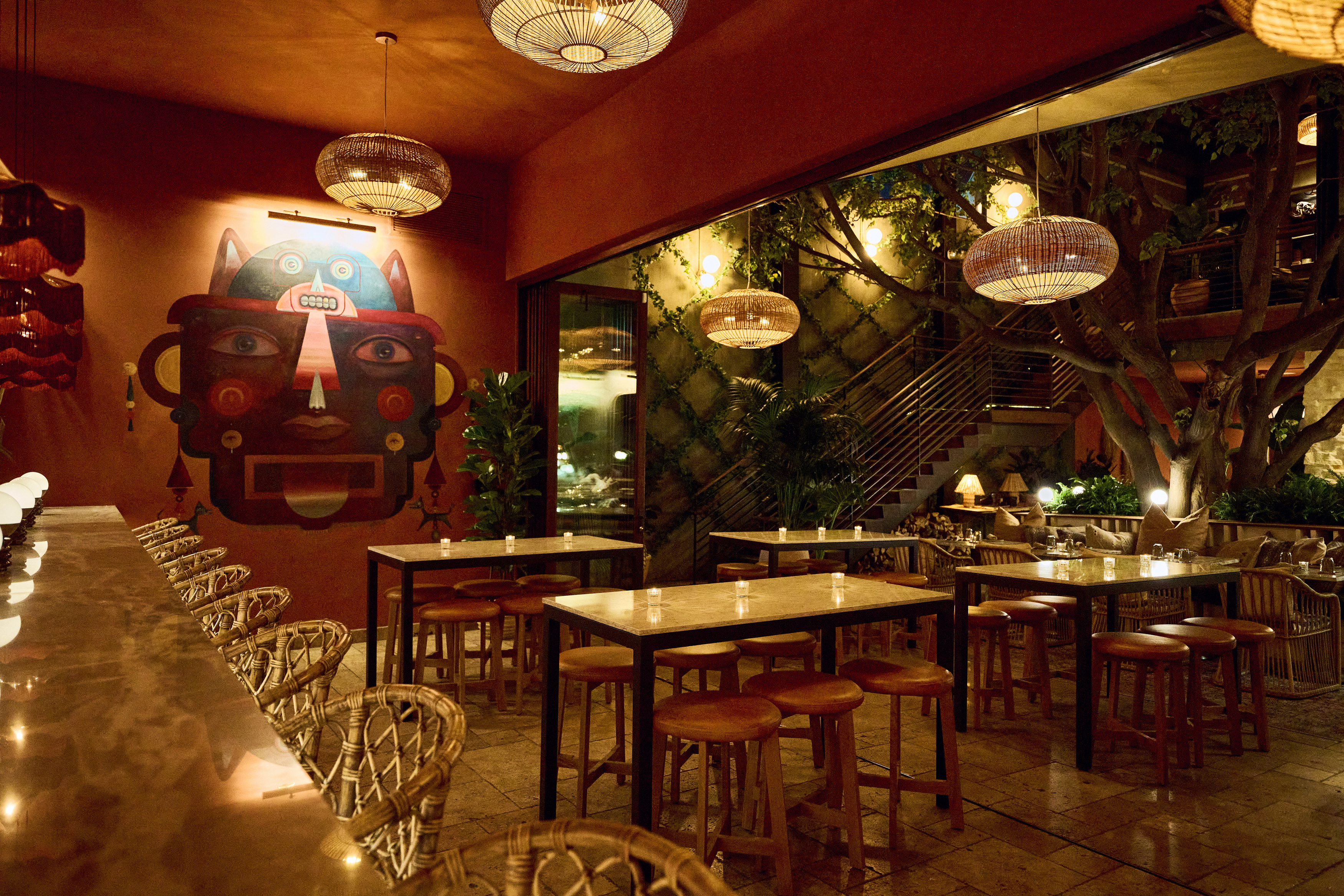 A dining area and bar at Mírate restaurant in Los Angeles, California.