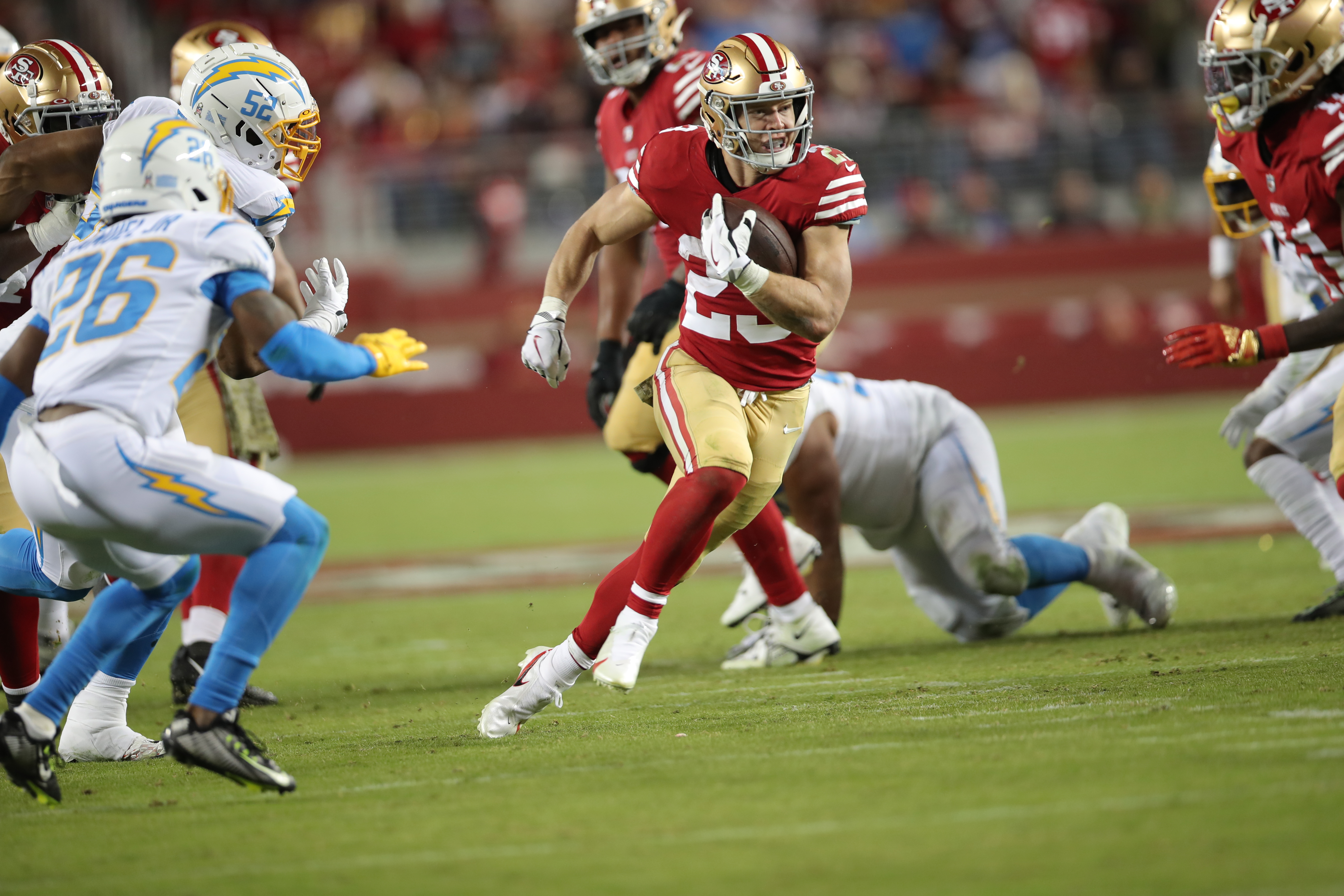 Christian McCaffrey #23 of the San Francisco 49ers rushes during the game against the Los Angeles Chargers at Levi’s Stadium on November 13, 2022 in Santa Clara, California. The 49ers defeated the Chargers 22-16.
