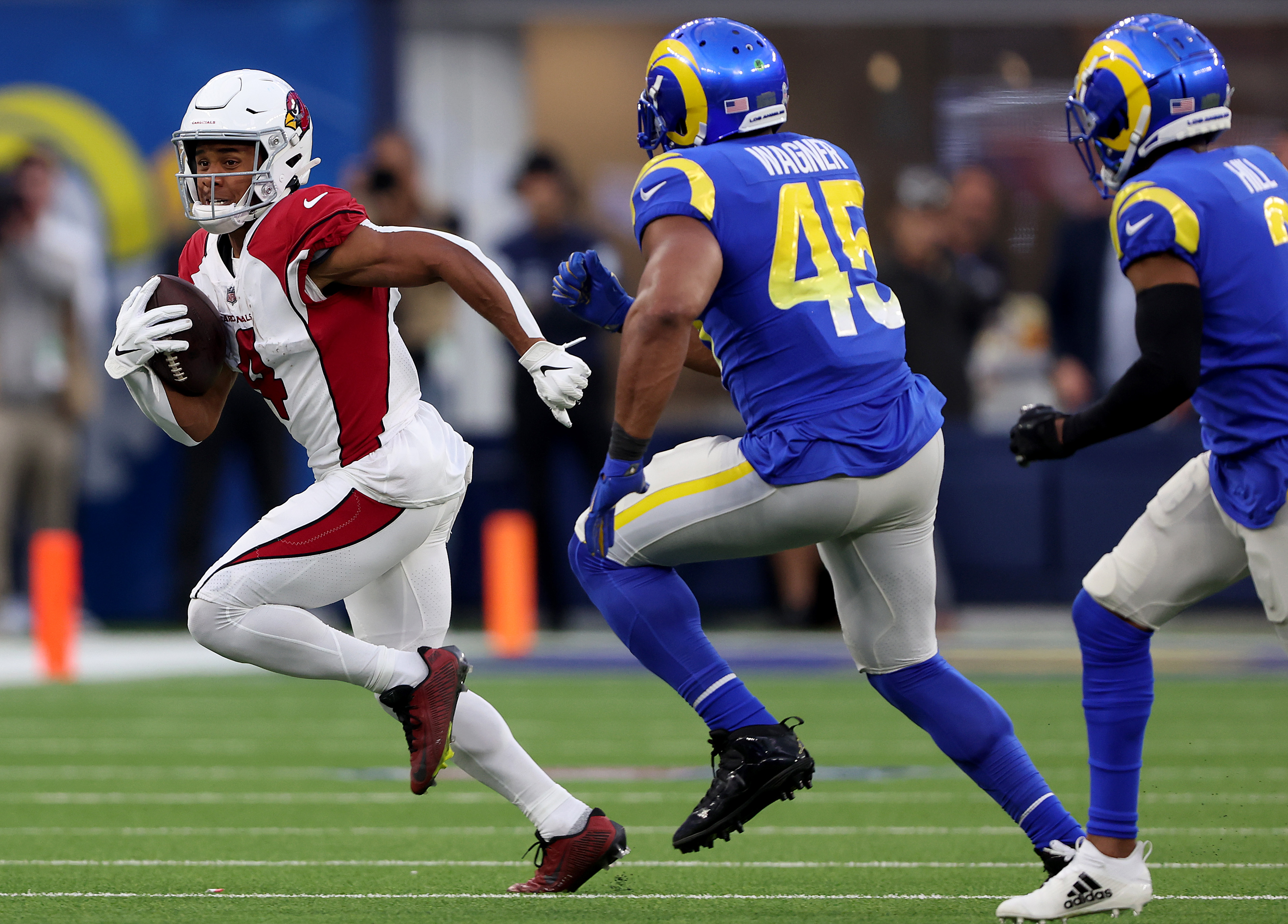Rondale Moore #4 of the Arizona Cardinals rushes the ball during a game against the Los Angeles Rams at SoFi Stadium on November 13, 2022 in Inglewood, California.