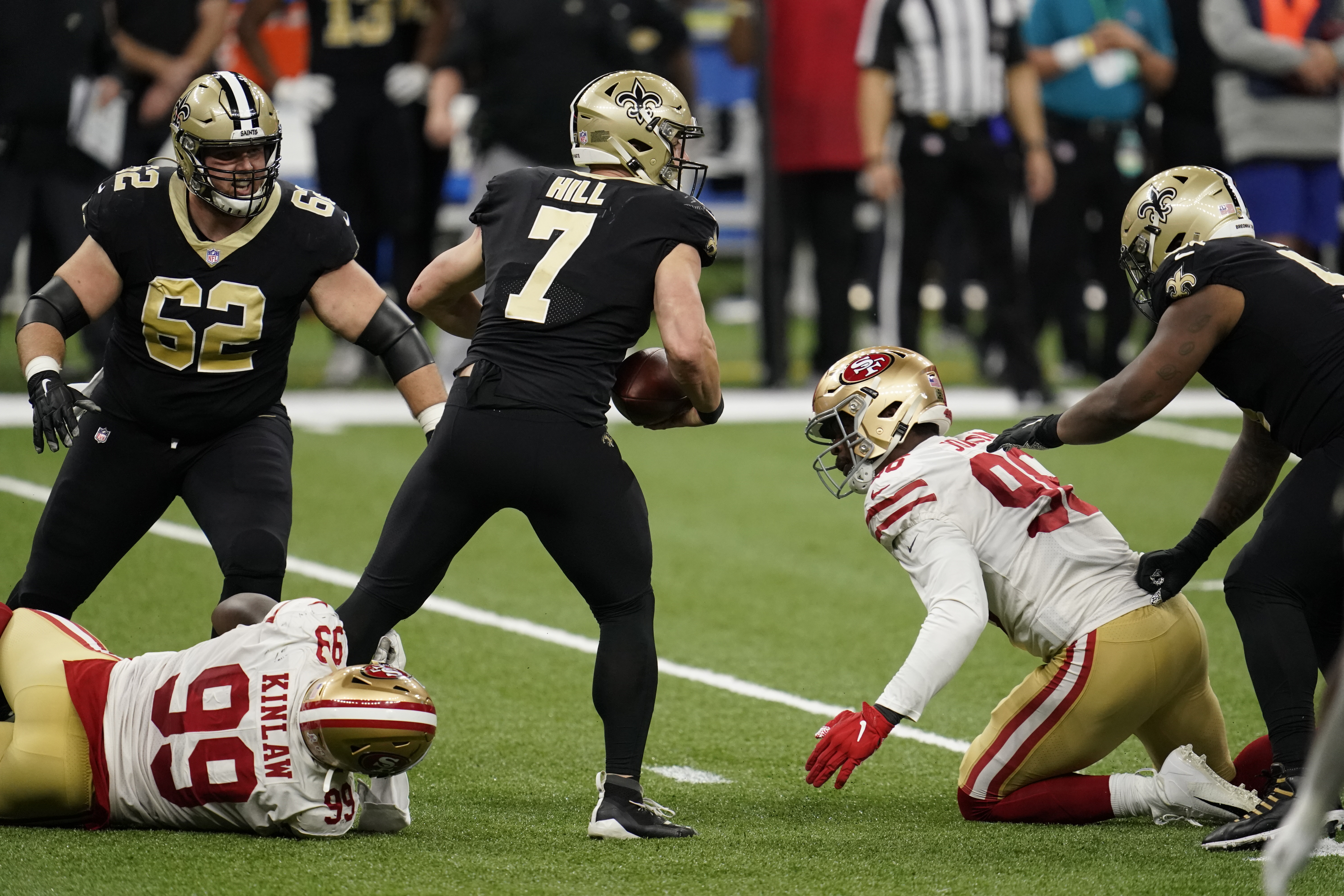 Javon Kinlaw #99 of the San Francisco 49ers sacks Taysom Hill #7 of the New Orleans Saints during an NFL game at Mercedes-Benz Superdome on November 15, 2020 in New Orleans, Louisiana.
