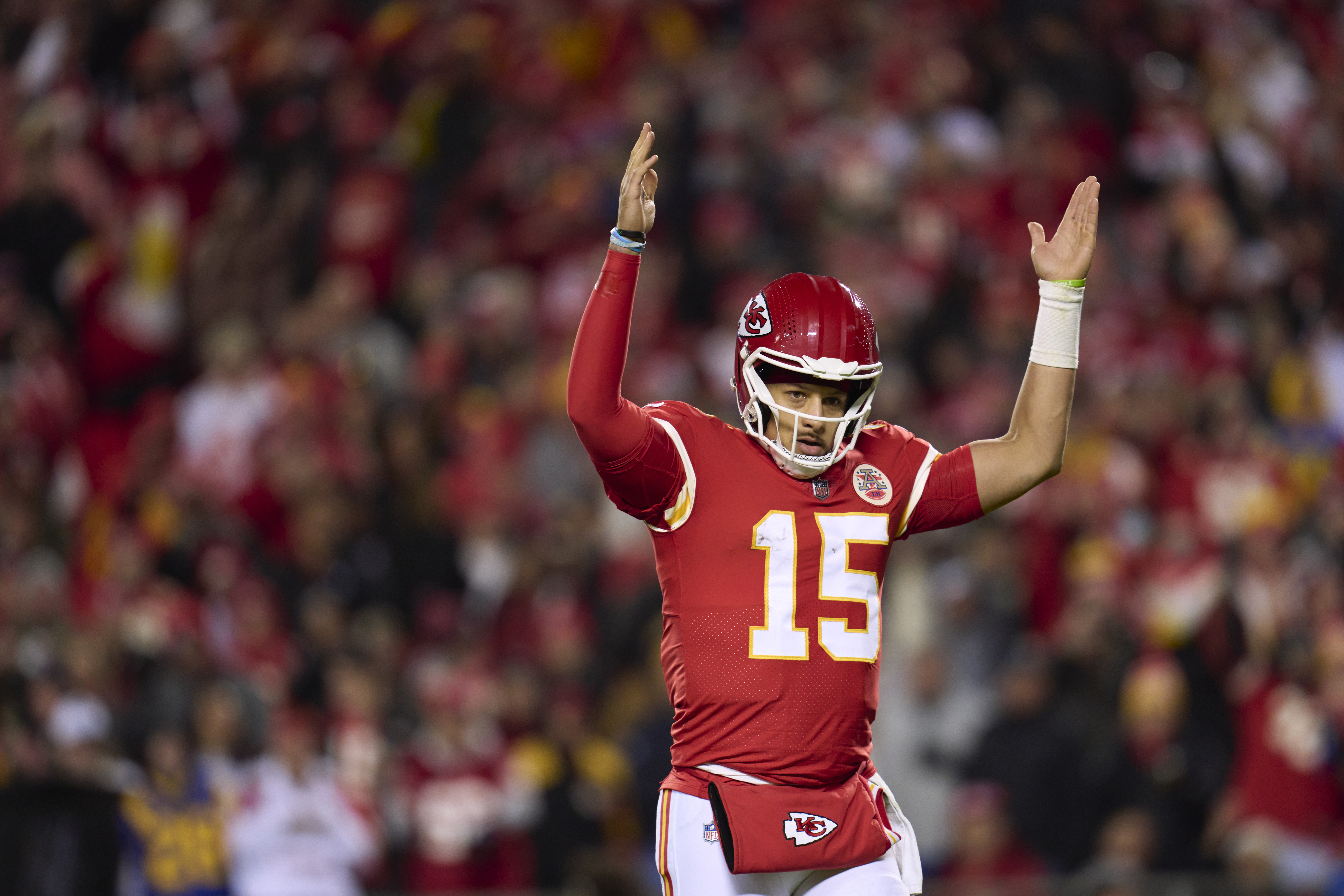 Patrick Mahomes #15 of the Kansas City Chiefs celebrates after scoring a touchdown against the Los Angeles Rams during the second half at GEHA Field at Arrowhead Stadium on November 27, 2022 in Kansas City, Missouri.