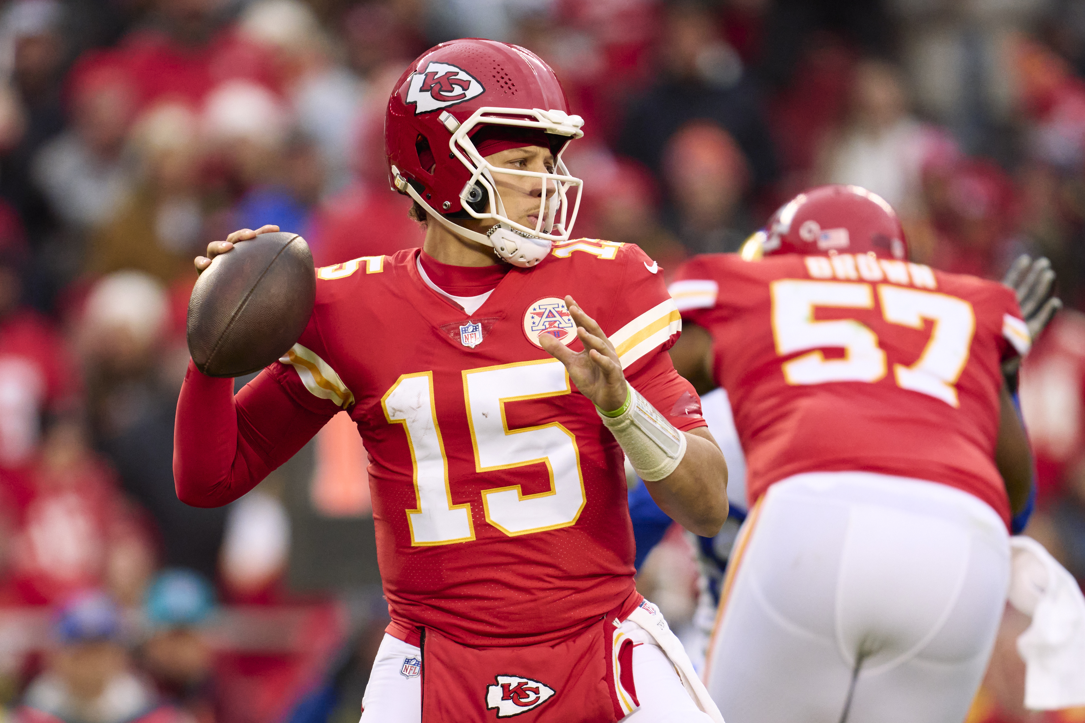 Patrick Mahomes #15 of the Kansas City Chiefs drops back to pass against the Los Angeles Rams during the first half at GEHA Field at Arrowhead Stadium on November 27, 2022 in Kansas City, Missouri.