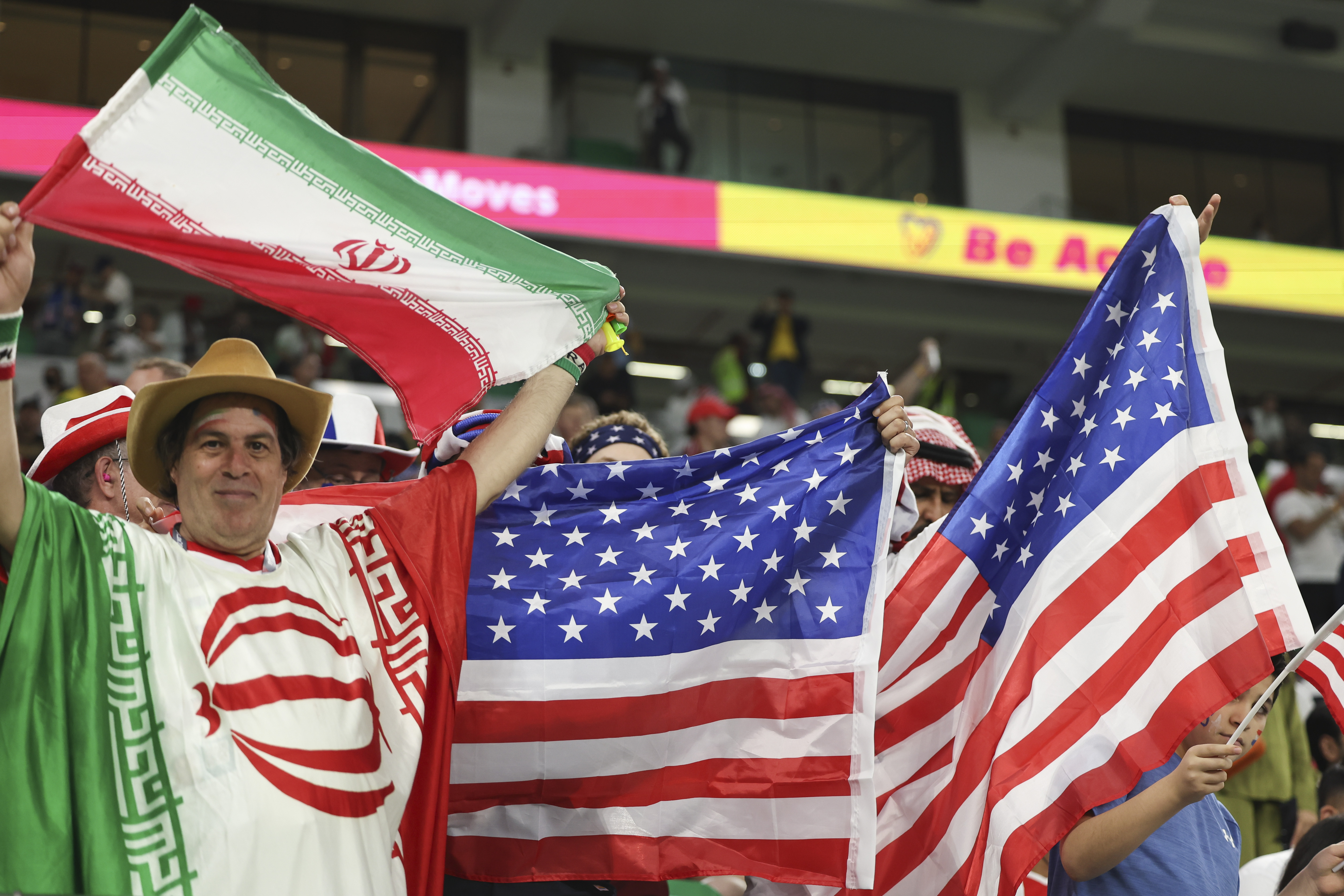 Fans of Iran and USA together with flags during the FIFA World Cup Qatar 2022 Group B match between IR Iran and USA at Al Thumama Stadium on November 29, 2022 in Doha, Qatar.