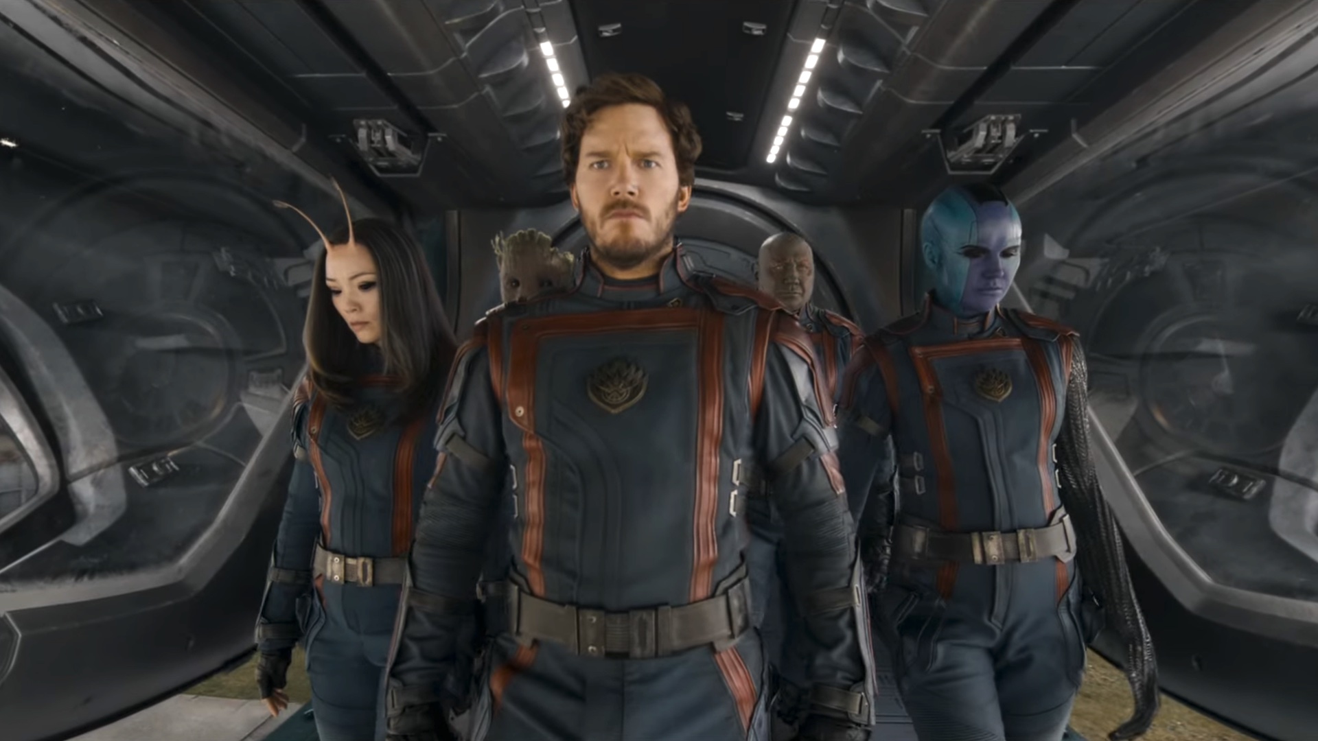 The Guardians of the Galaxy, including Mantis, Star-Lord, Groot, Drax, and Nebula, emerge from their ship