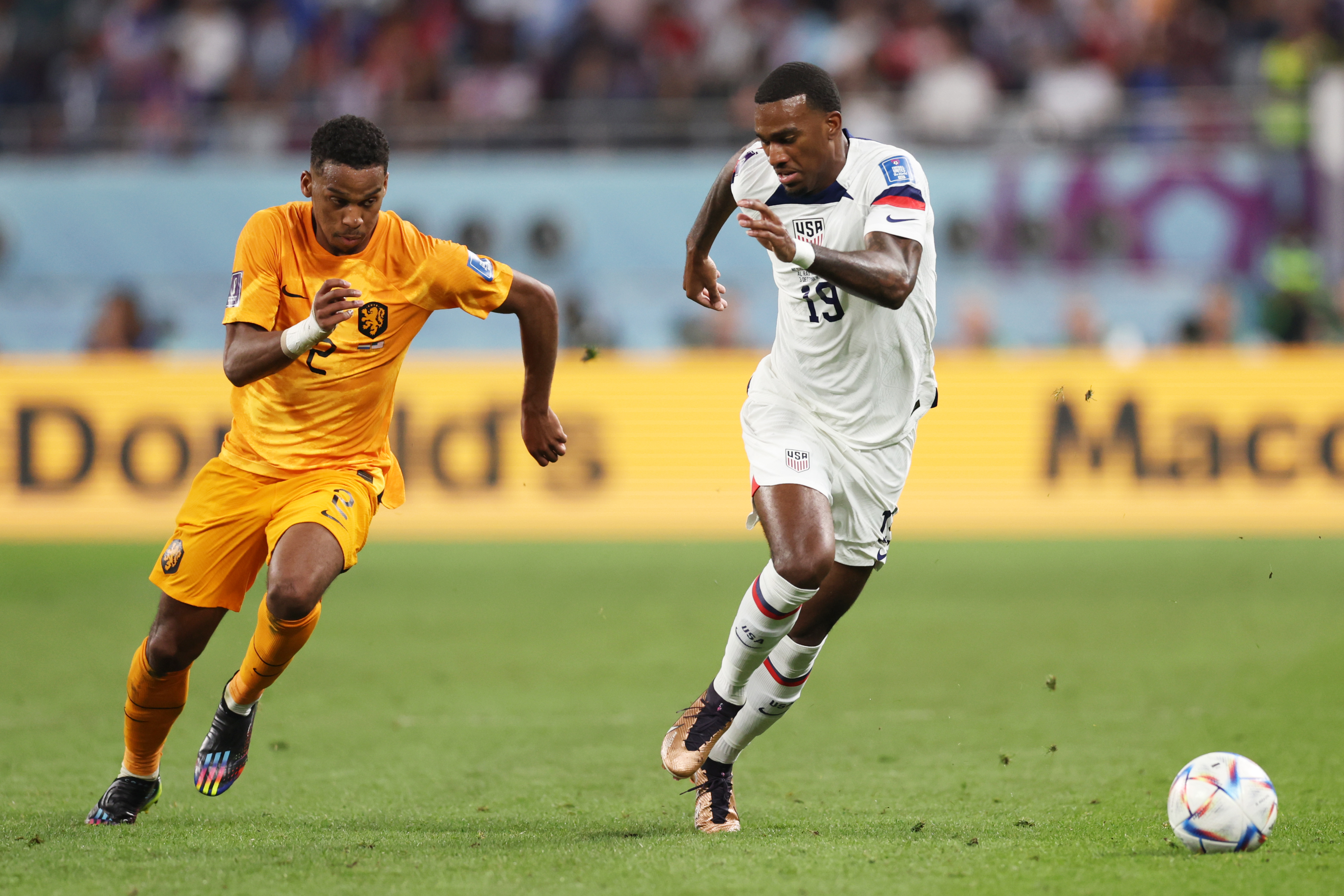 Jurrien Timber of Netherlands battles for possession with Haji Wright of United States during the FIFA World Cup Qatar 2022 Round of 16 match between Netherlands and USA at Khalifa International Stadium on December 03, 2022 in Doha, Qatar.