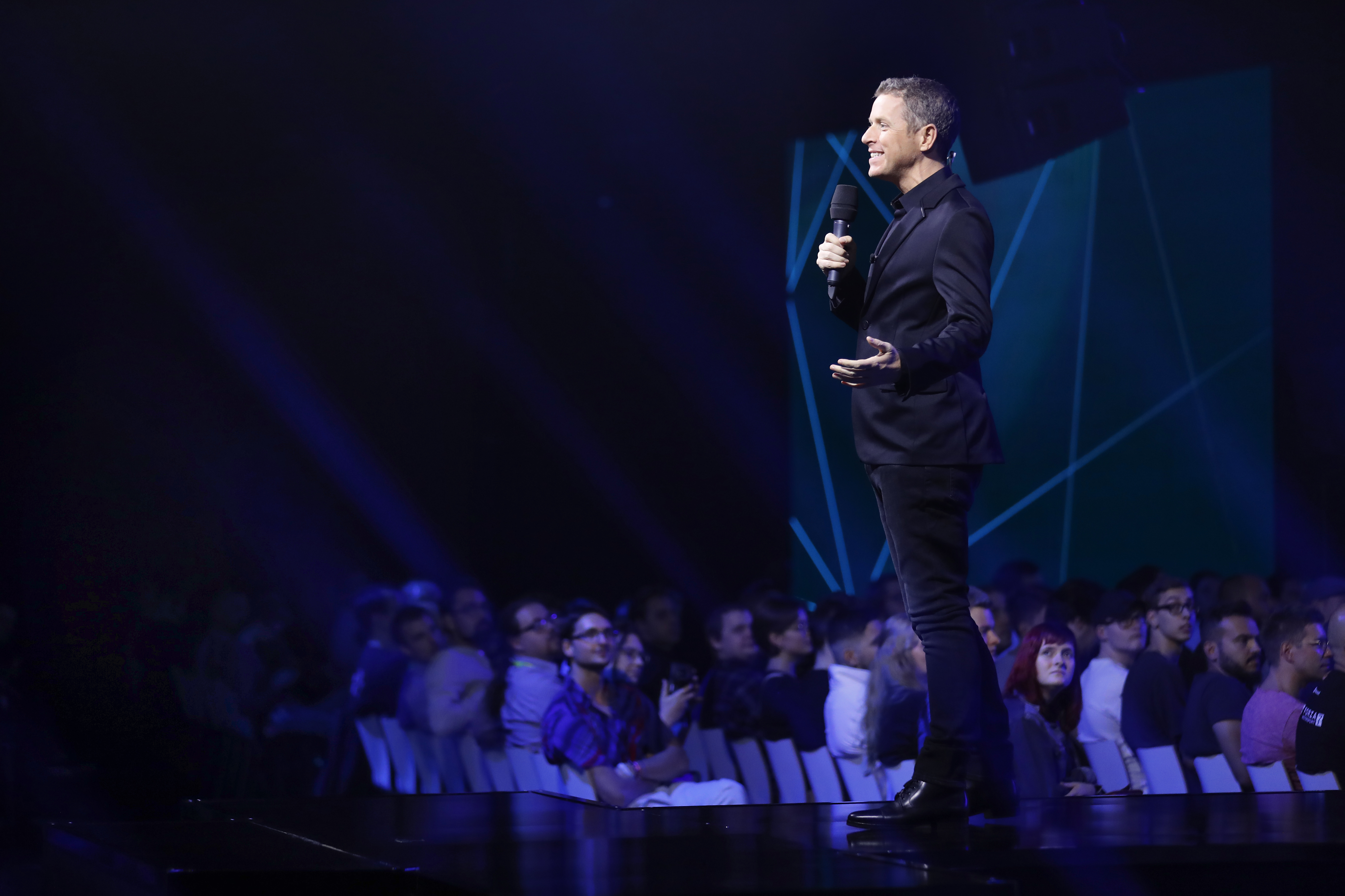 Geoff Keighley presents on stage during the Gamescom 2019 opening night in Cologne, Germany