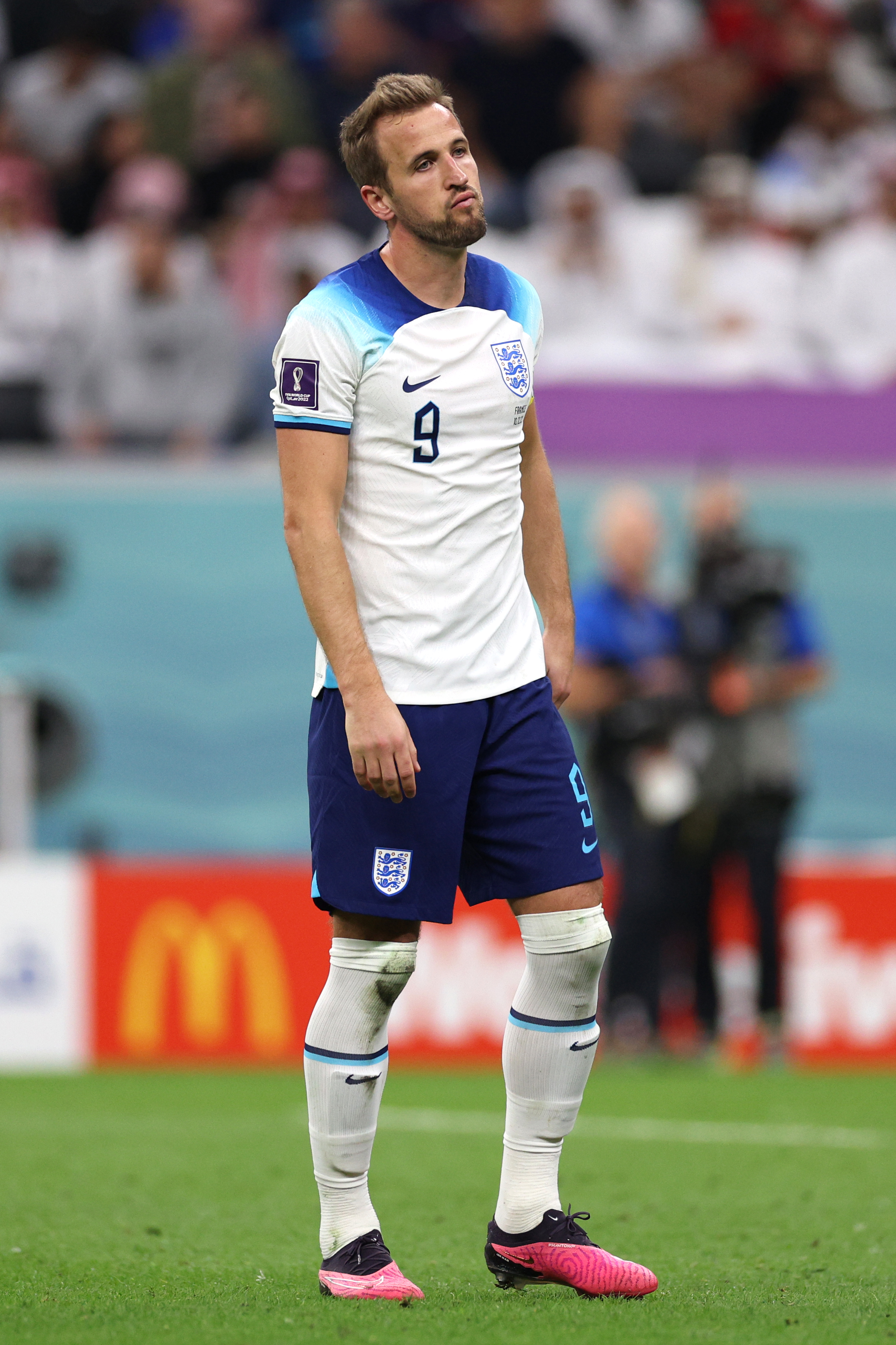 Harry Kane of England looks dejected after their sides’ elimination from the tournament during the FIFA World Cup Qatar 2022 quarter final match between England and France at Al Bayt Stadium on December 10, 2022 in Al Khor, Qatar.