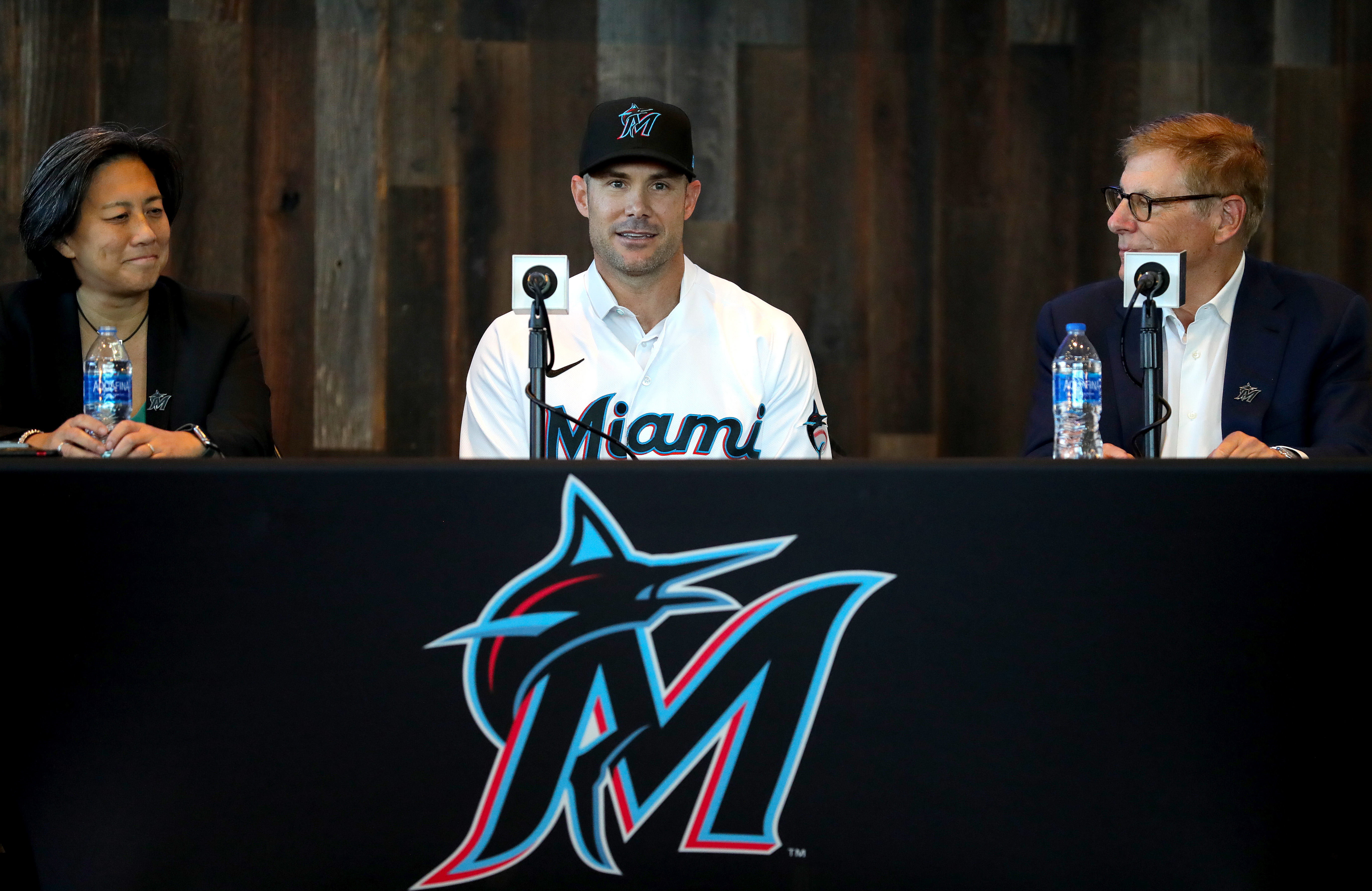 General manager Kim Ng, manager Skip Schumaker, and owner Bruce Sherman of the Miami Marlins speak to the media during a press conference at loanDepot park on November 03, 2022 in Miami, Florida.