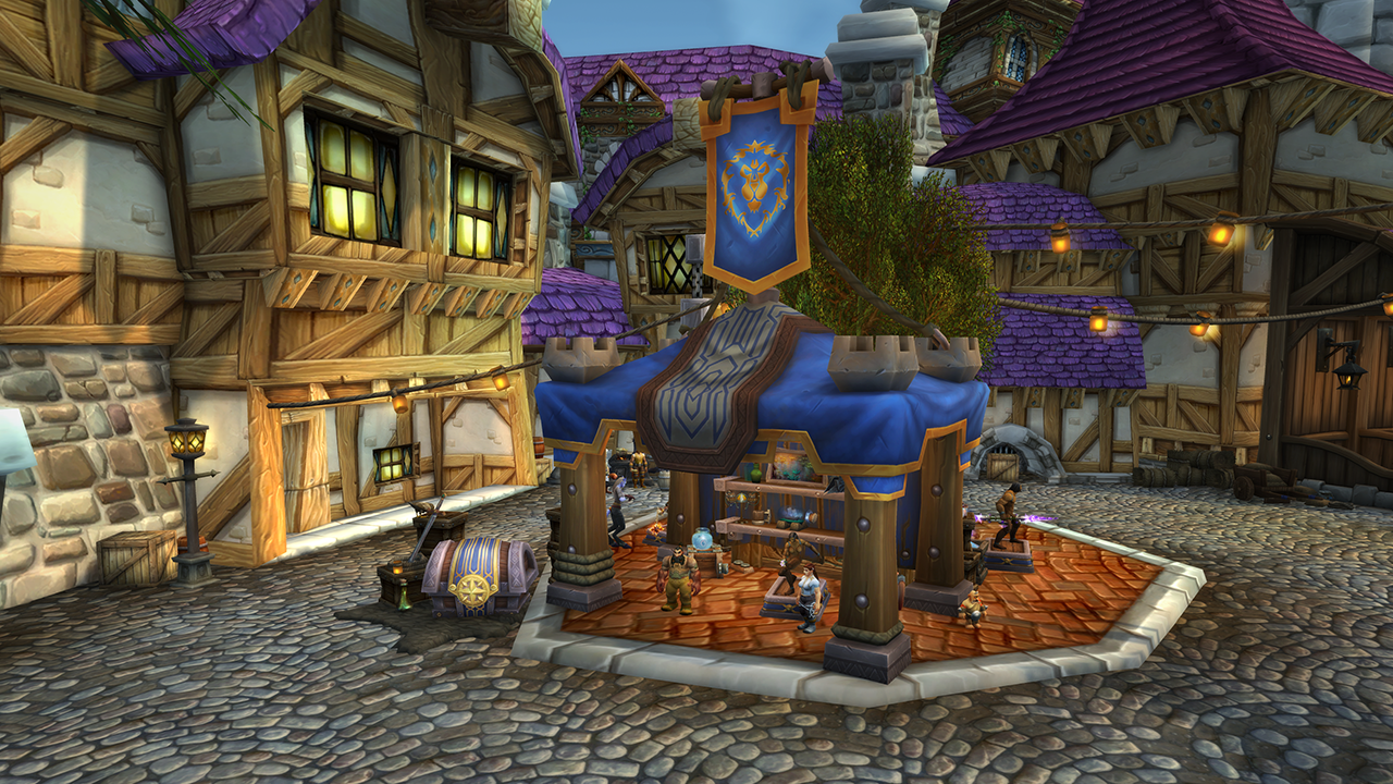In-game image of World of Warcraft’s new Trading Post feature in Stormwind; a makeshift building with purple fabric awnings sits in a town square with wares on display.