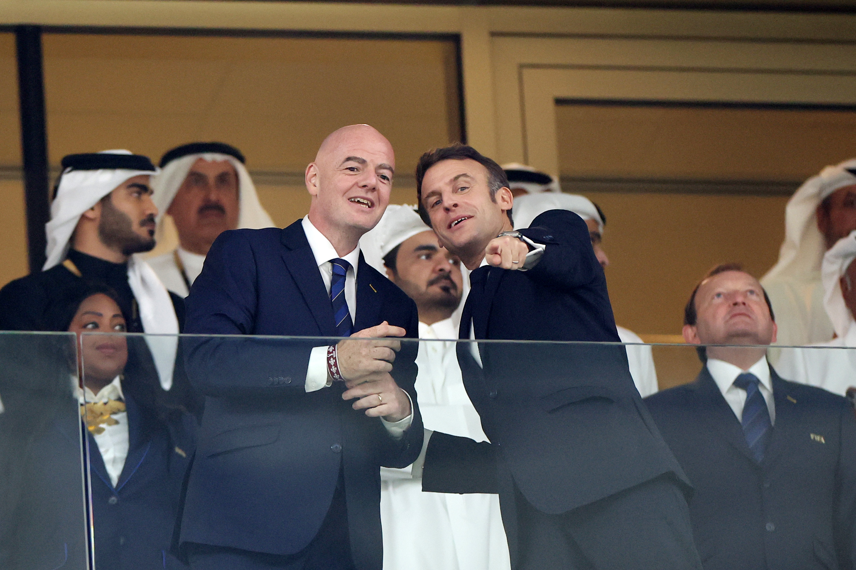 Gianni Infantino, President of FIFA, and French President Emmanuel Macron shake hands prior to the FIFA World Cup Qatar 2022 Final match between Argentina and France at Lusail Stadium on December 18, 2022 in Lusail City, Qatar.