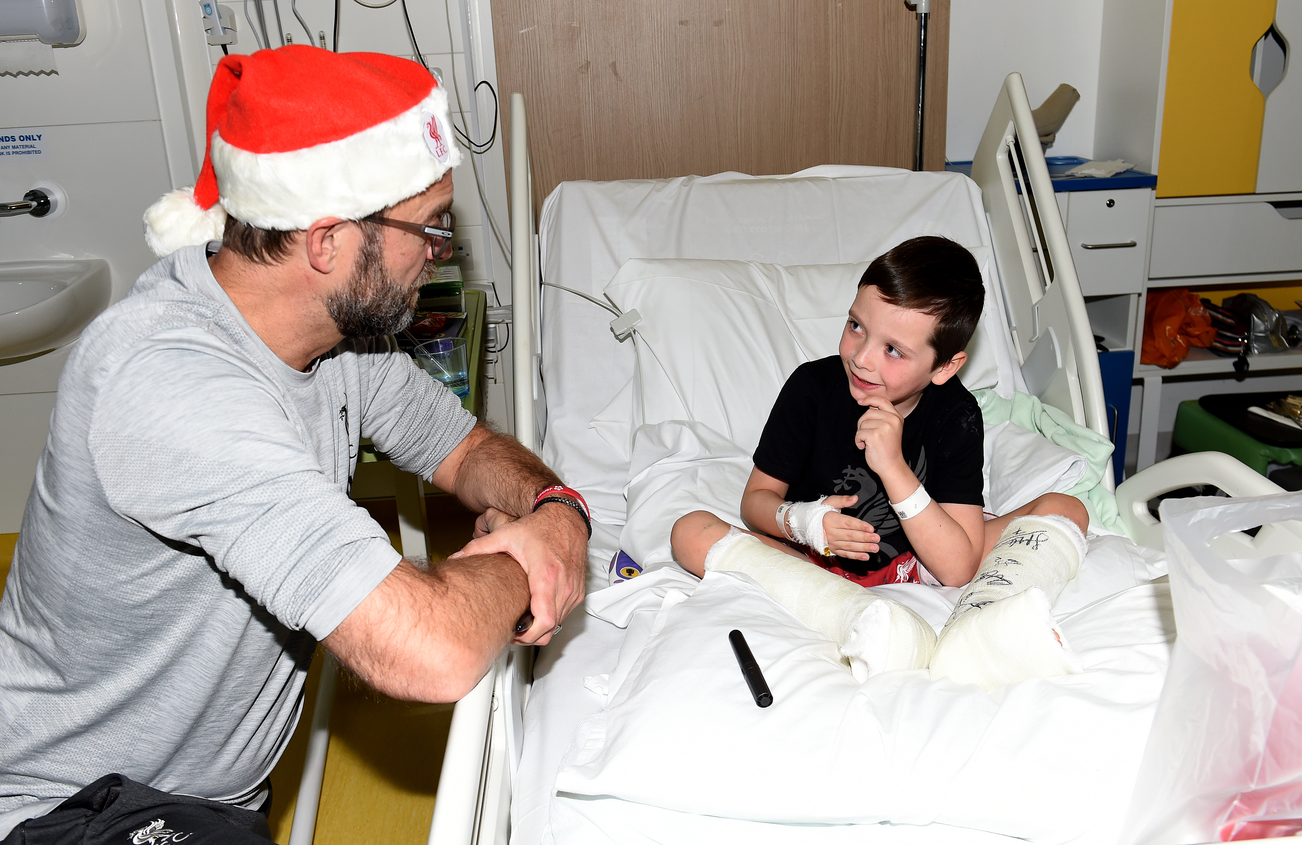 Liverpool Players Deliver Christmas Gifts to Alder Hey Hospital