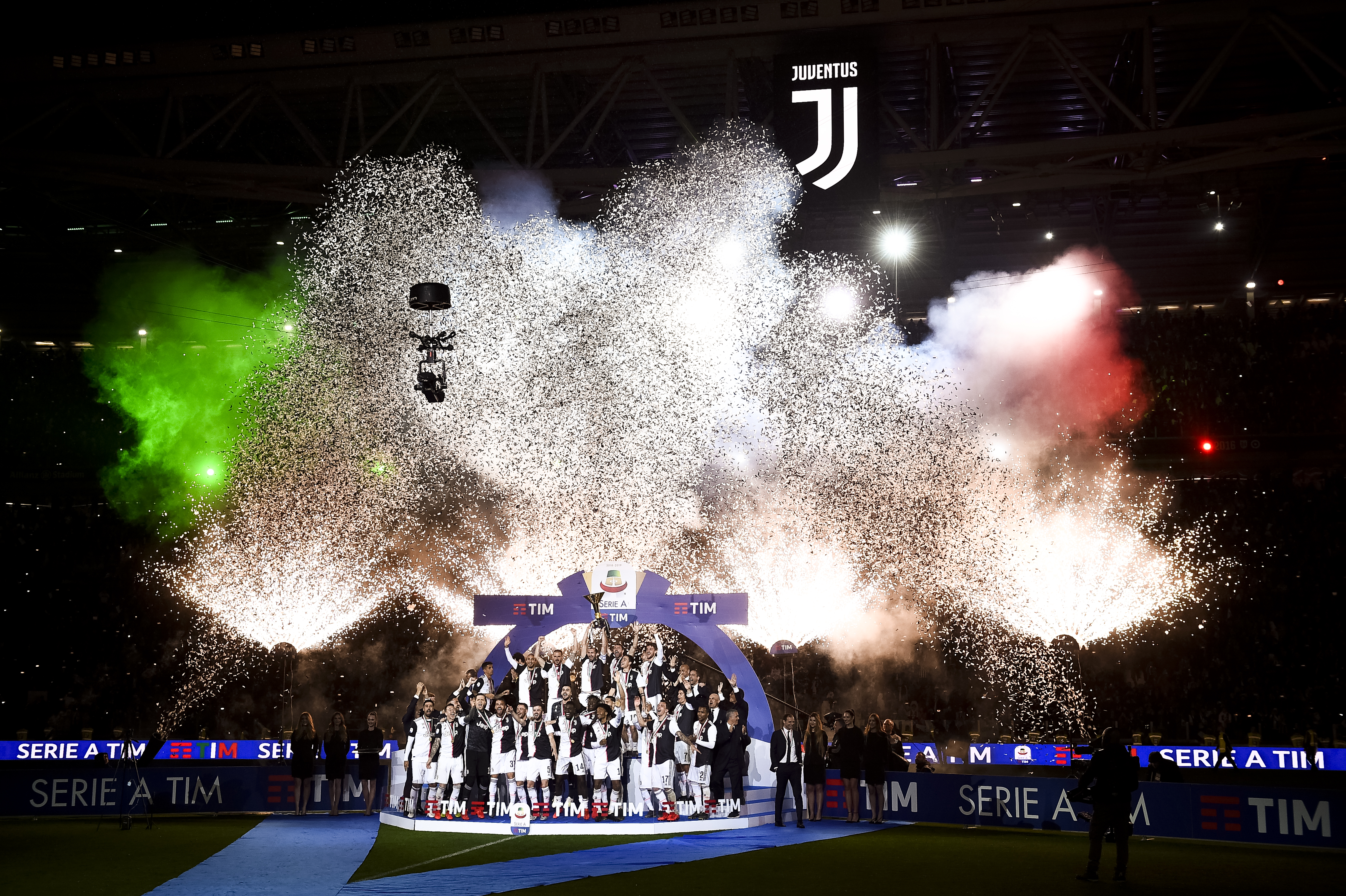Juventus FC players celebrate with the trophy after winning...