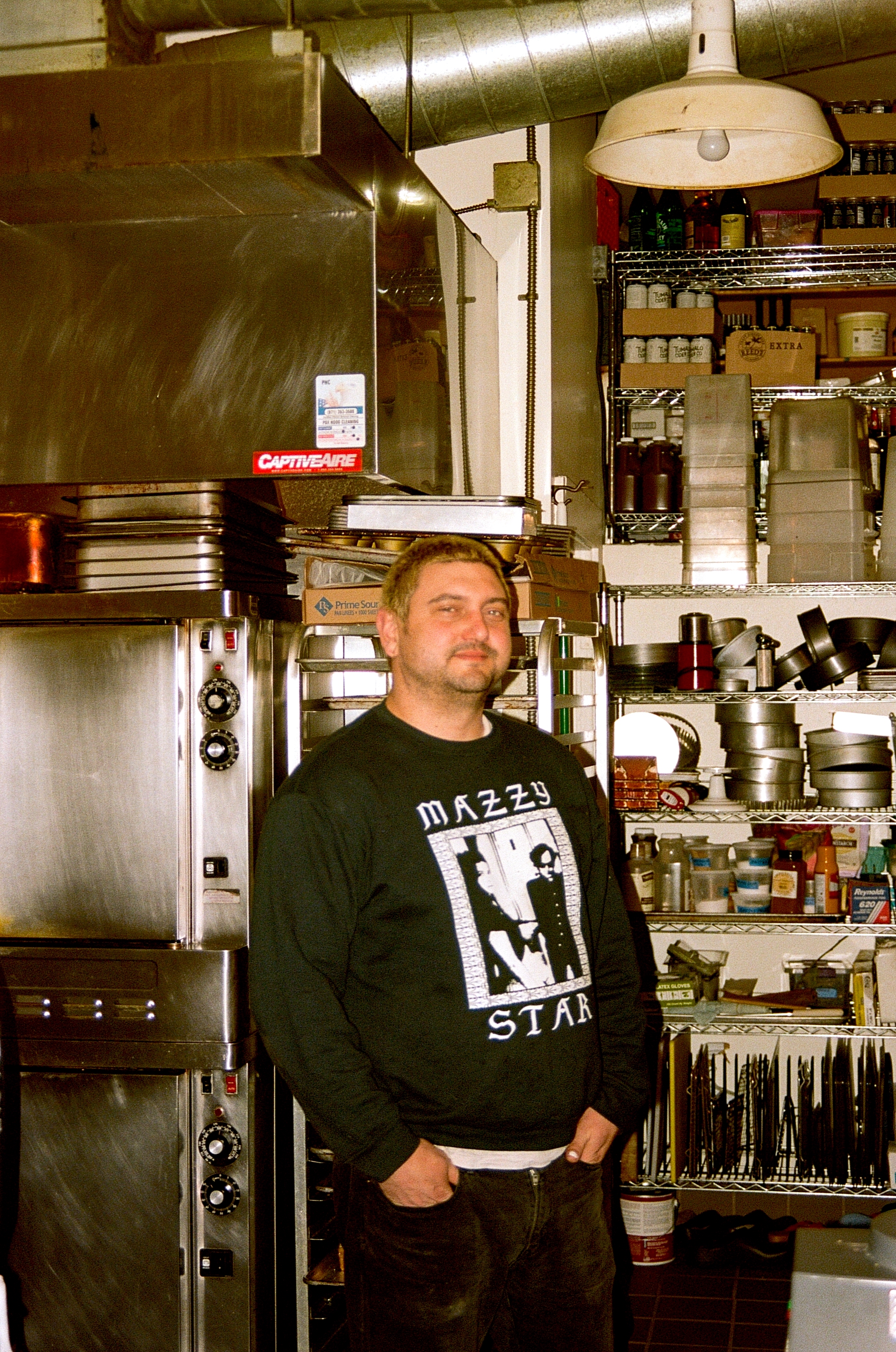 Chef Sam Smith stands in the kitchen at Sweedeedee.