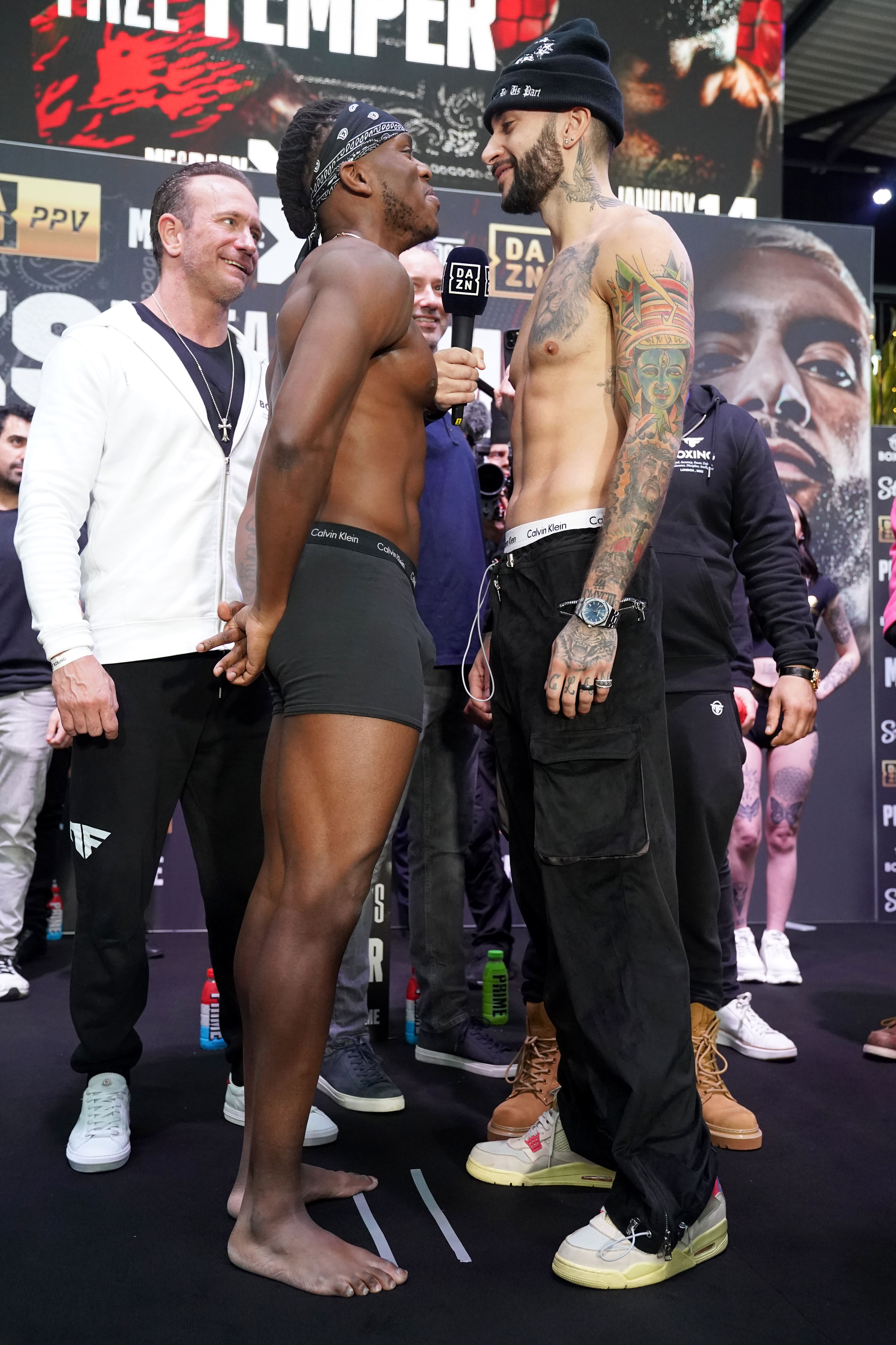 KSI (left) and FaZe Temperrr during the weigh-in at BOXPARK Wembley, London.