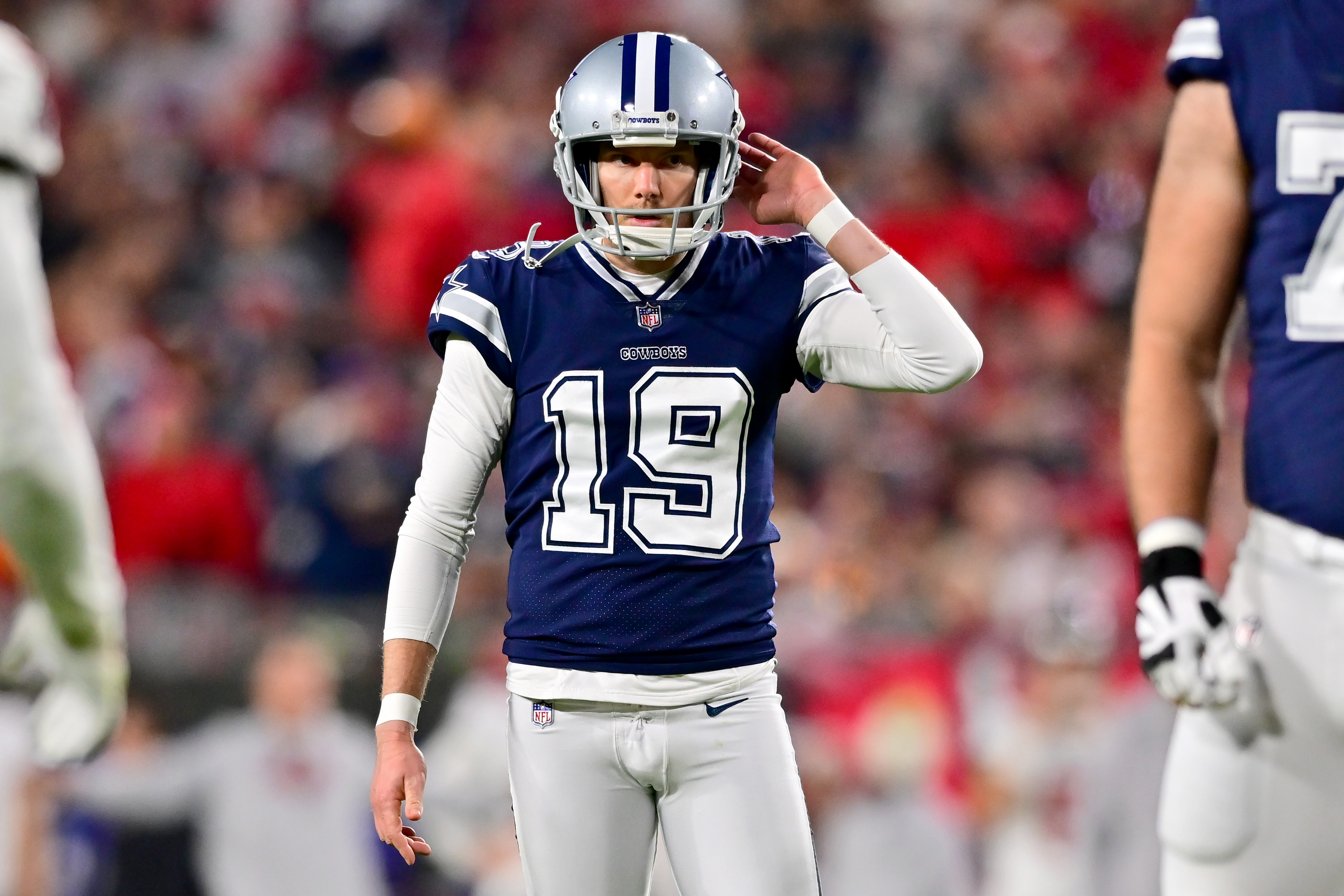 Brett Maher of the Dallas Cowboys reacts after missing an extra point against the Tampa Bay Buccaneers during the third quarter in the NFC Wild Card playoff game at Raymond James Stadium on January 16, 2023 in Tampa, Florida.