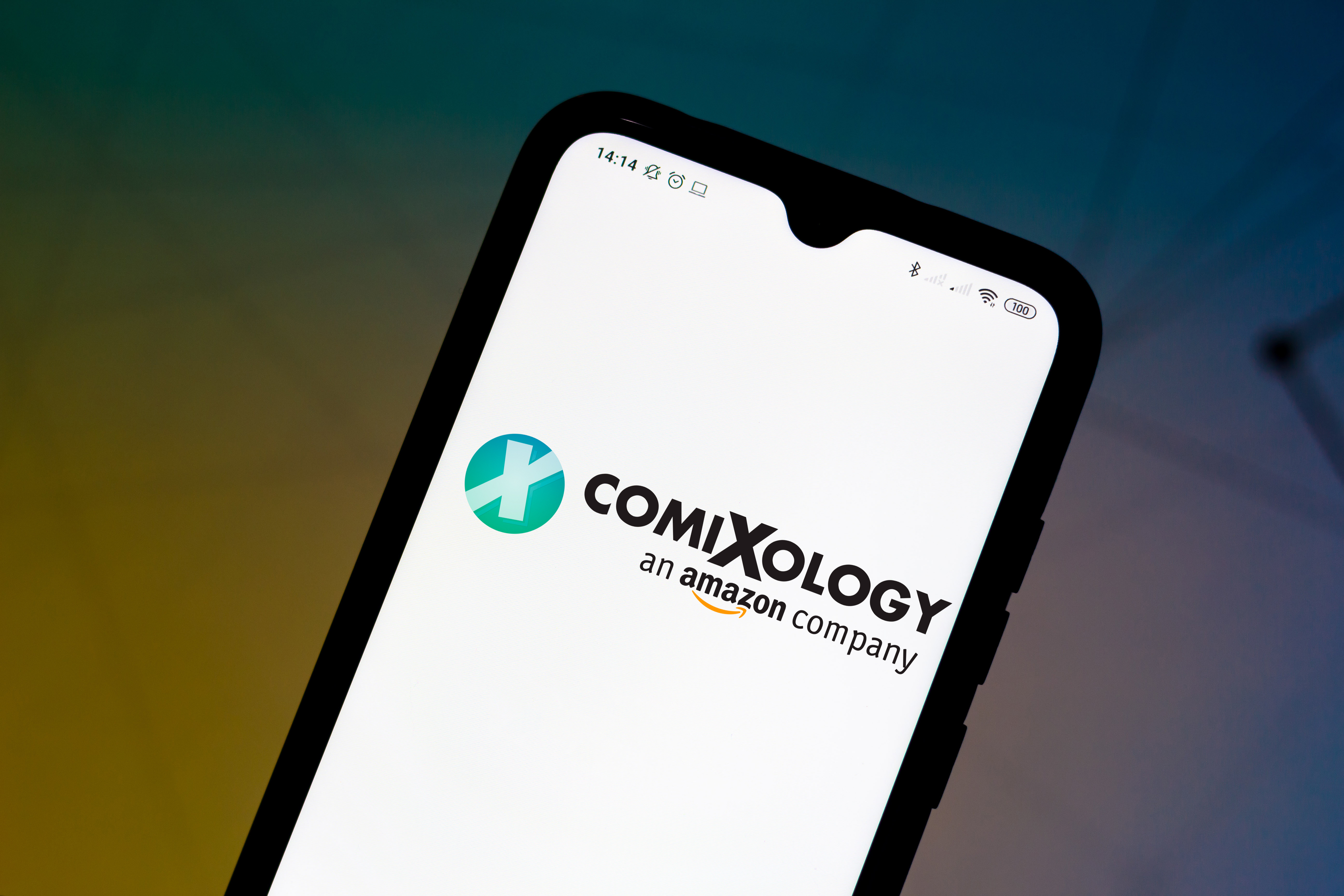 In this photo illustration the ComiXology logo seen...