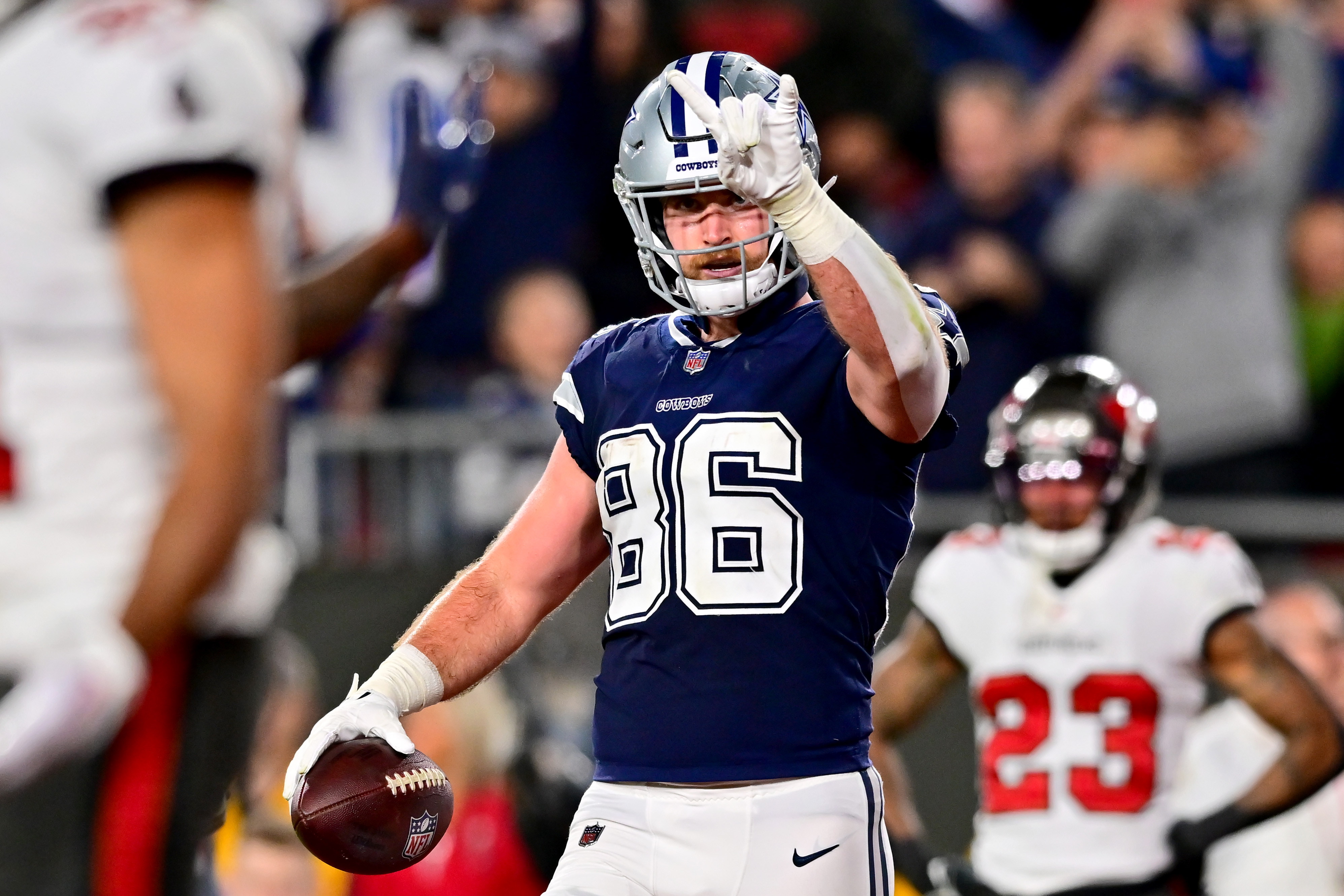 TAMPA, FLORIDA - JANUARY 16: Dalton Schultz #86 of the Dallas Cowboys celebrates after scoring a touchdown against the Tampa Bay Buccaneers during the second quarter in the NFC Wild Card playoff game at Raymond James Stadium on January 16, 2023 in Tampa, Florida.