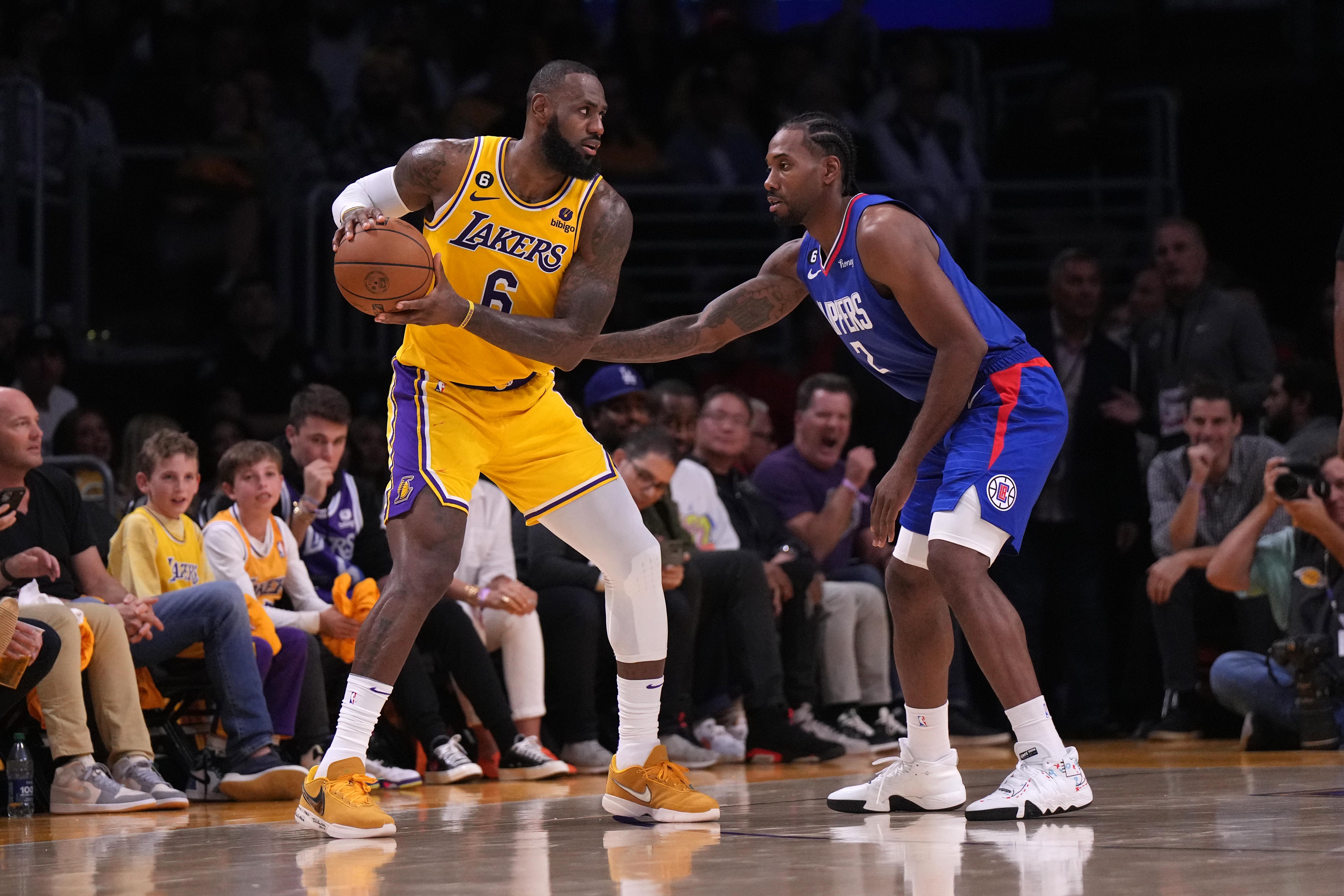 Los Angeles Lakers forward LeBron James (6) is defended by LA Clippers forward Kawhi Leonard (2) in the second half at Crypto.com Arena. The Clippers defeated the Lakers 103-97.&nbsp;