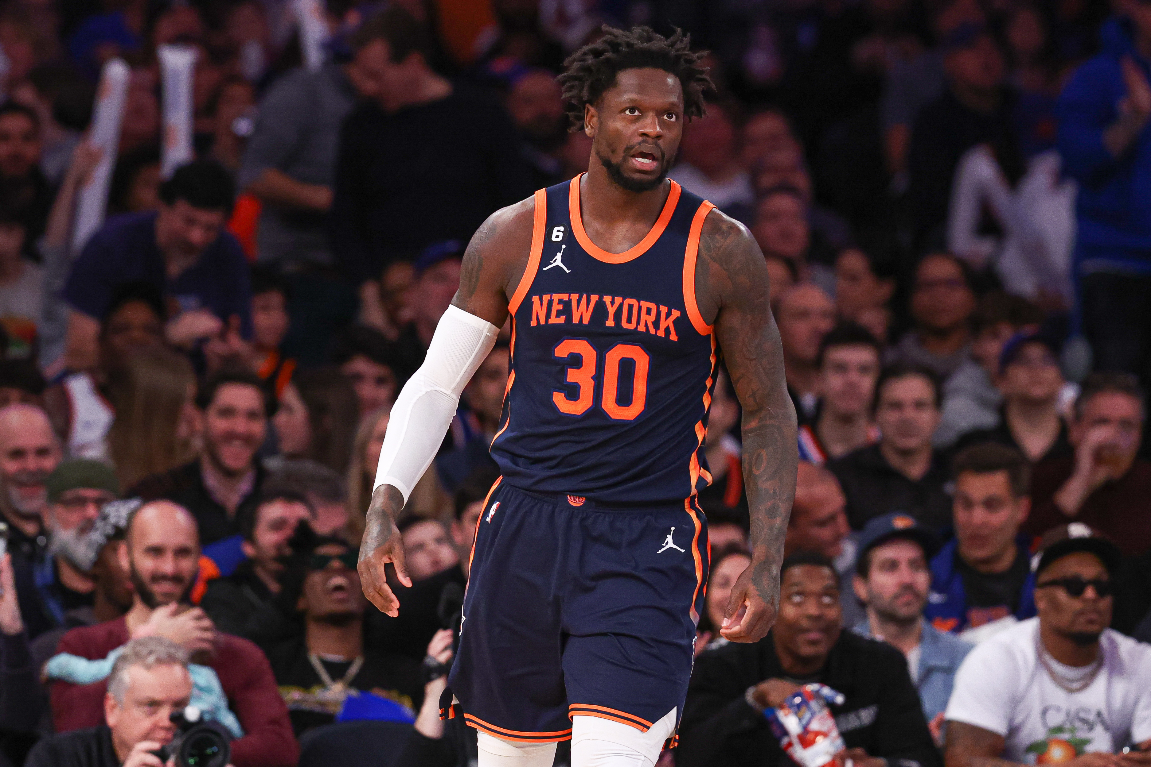 New York Knicks forward Julius Randle (30) reacts after a basket against the Toronto Raptors during the first half at Madison Square Garden.