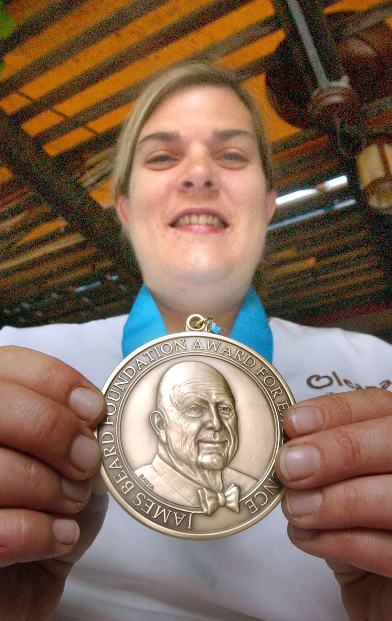 (6/17/05 CAMBRIDGE,MA) THE HERALD MEETS CHEF ANA SORTUN AT OLEANA RESTARAUNT. Sortun displays her James Beard medal at the restaraunt ({filename} - Staff Photo by Patrick Whittemore. Saved in Adv FOOD and Daily Photo Archive).