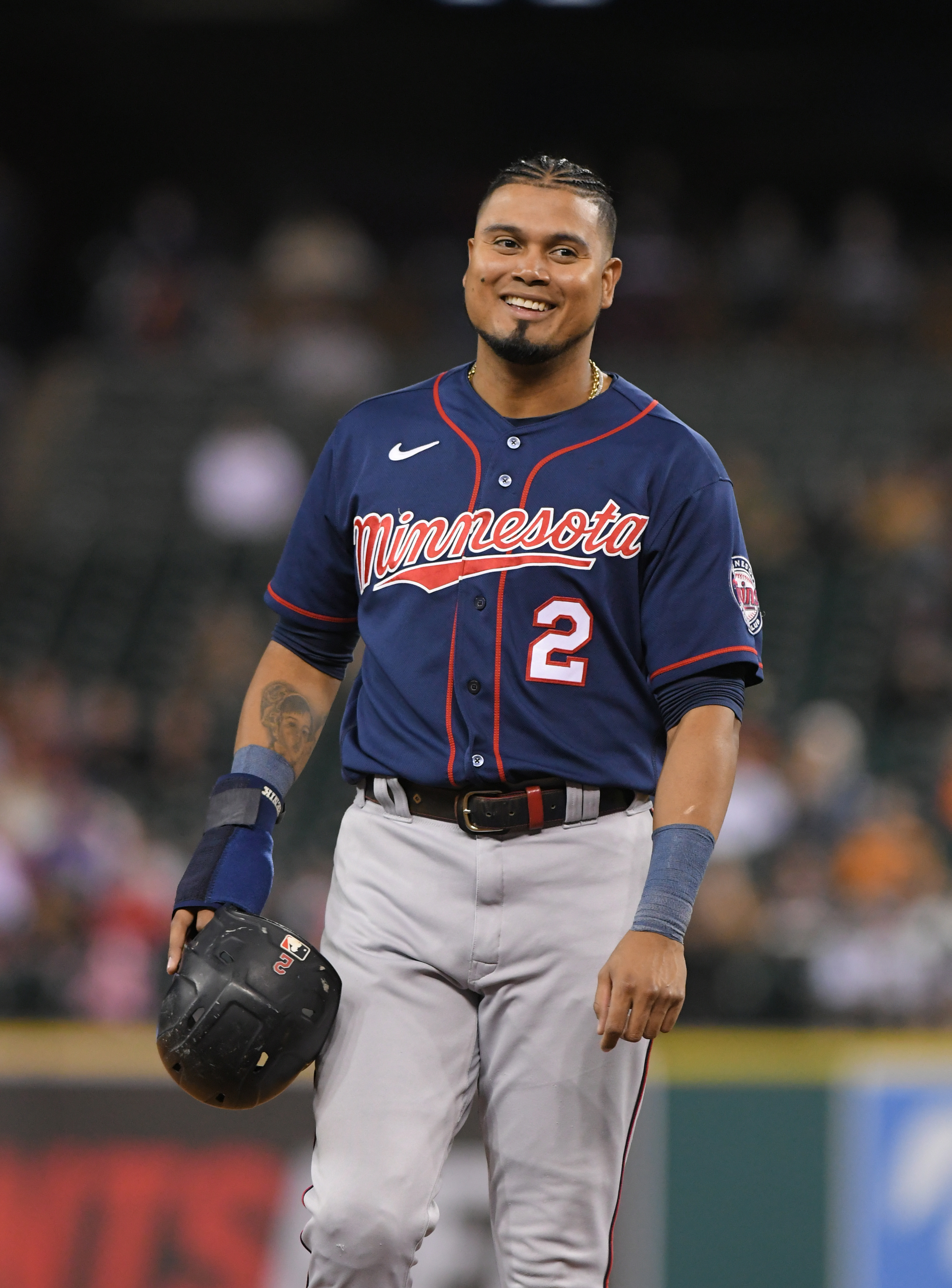 Luis Arraez #2 of the Minnesota Twins looks on and smiles during the game against the Detroit Tigers at Comerica Park on October 1, 2022 in Detroit, Michigan. The Tigers defeated the Twins 3-2.