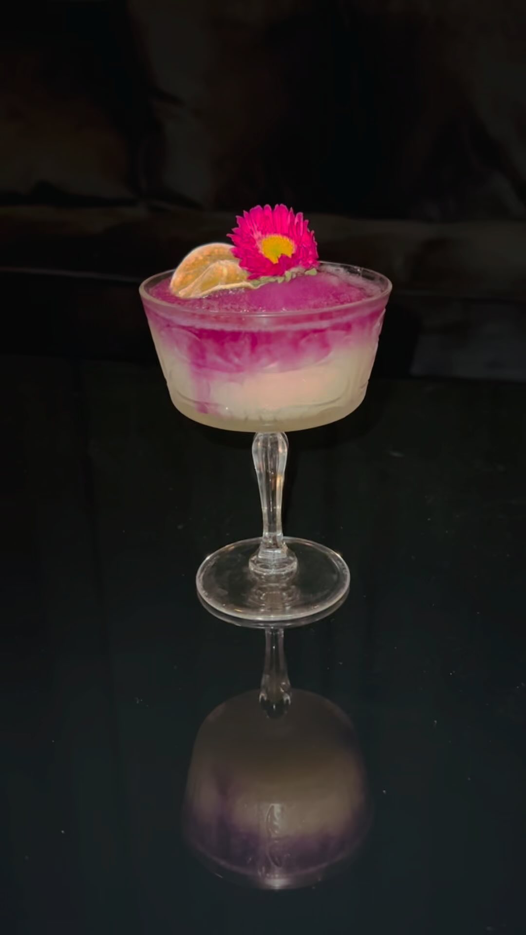 A purple and white cocktail.