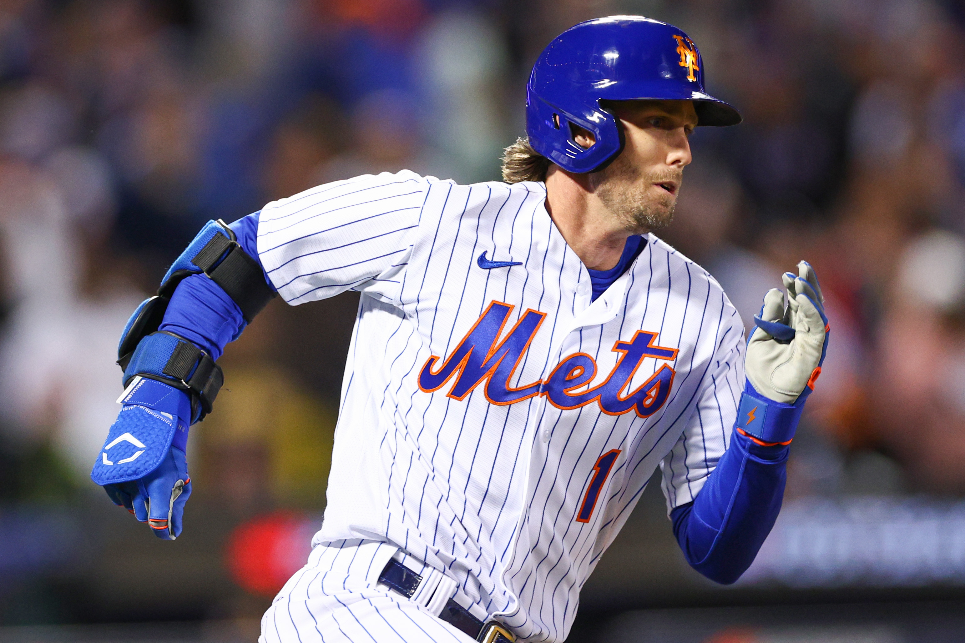 Jeff McNeil of the New York Mets hits a two run double during the seventh inning against the San Diego Padres in game two of the Wild Card Series at Citi Field on October 08, 2022 in New York City.