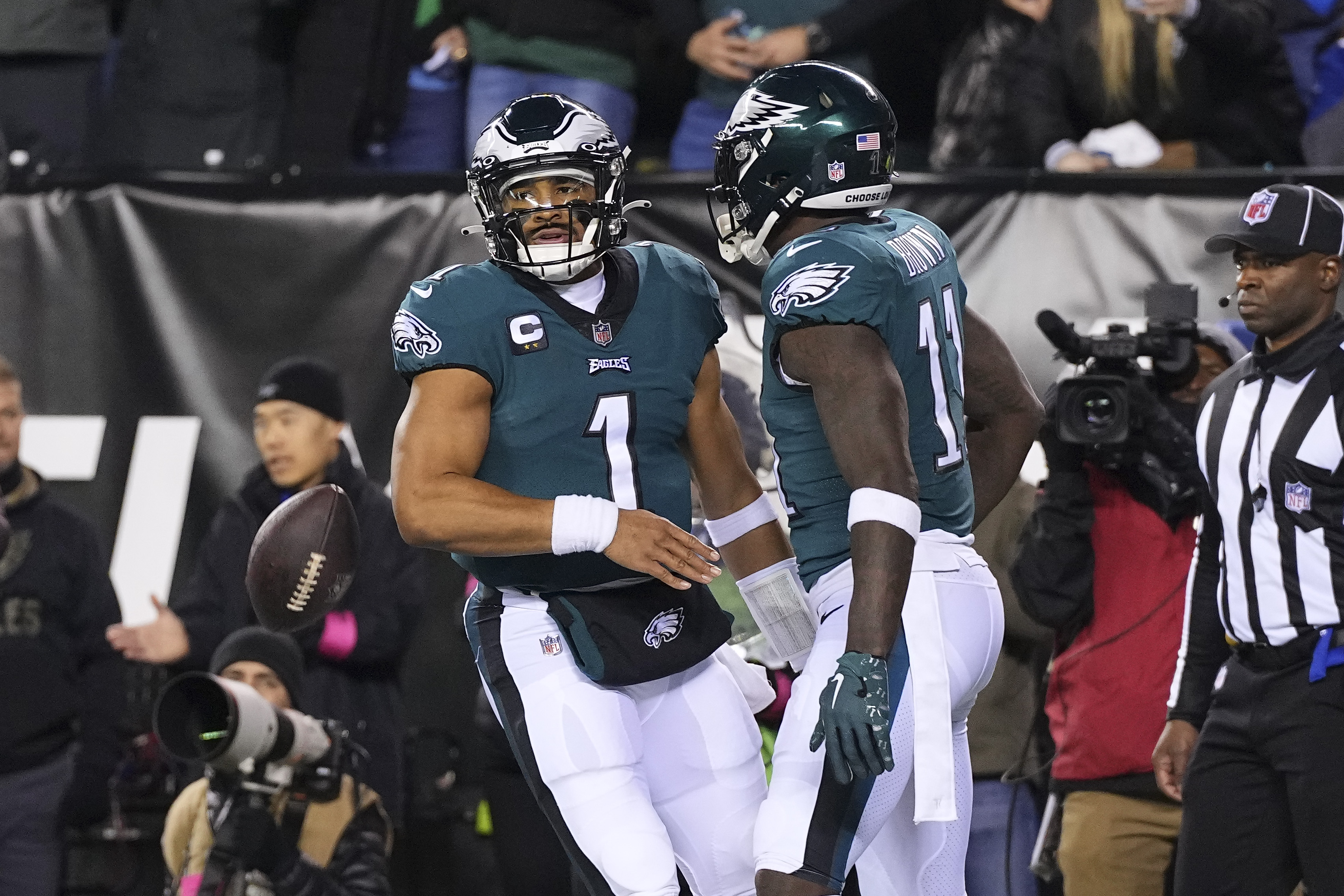 Jalen Hurts #1 and A.J. Brown #11 of the Philadelphia Eagles react against the New York Giants during the NFC Divisional Playoff game at Lincoln Financial Field on January 21, 2023 in Philadelphia, Pennsylvania.