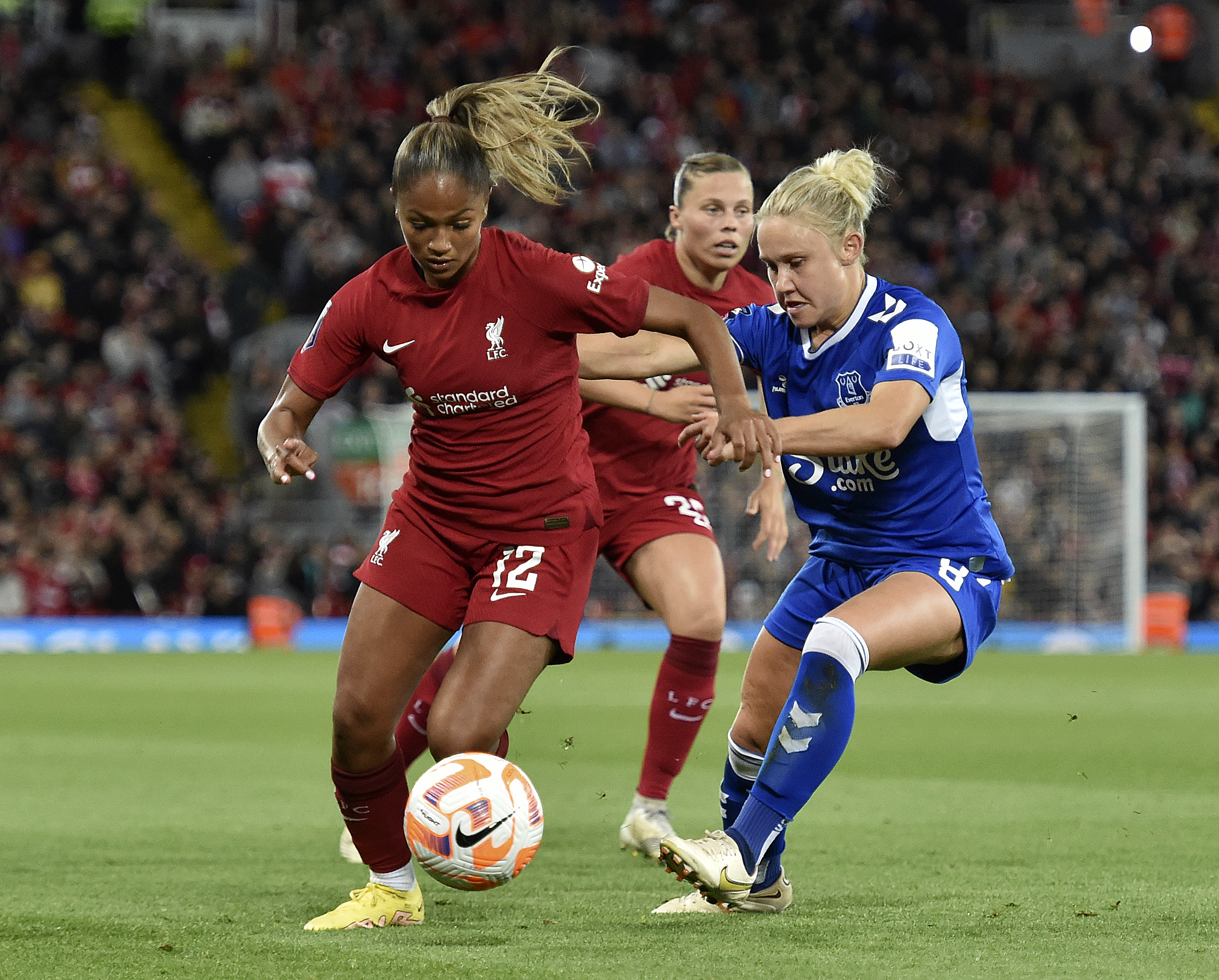 Taylor Hinds of Liverpool Women and Izzy Christiansen of Everton Women in action during the FA Women’s Super League match between Liverpool FC and Everton FC at Anfield on September 25, 2022 in Liverpool, United Kingdom.