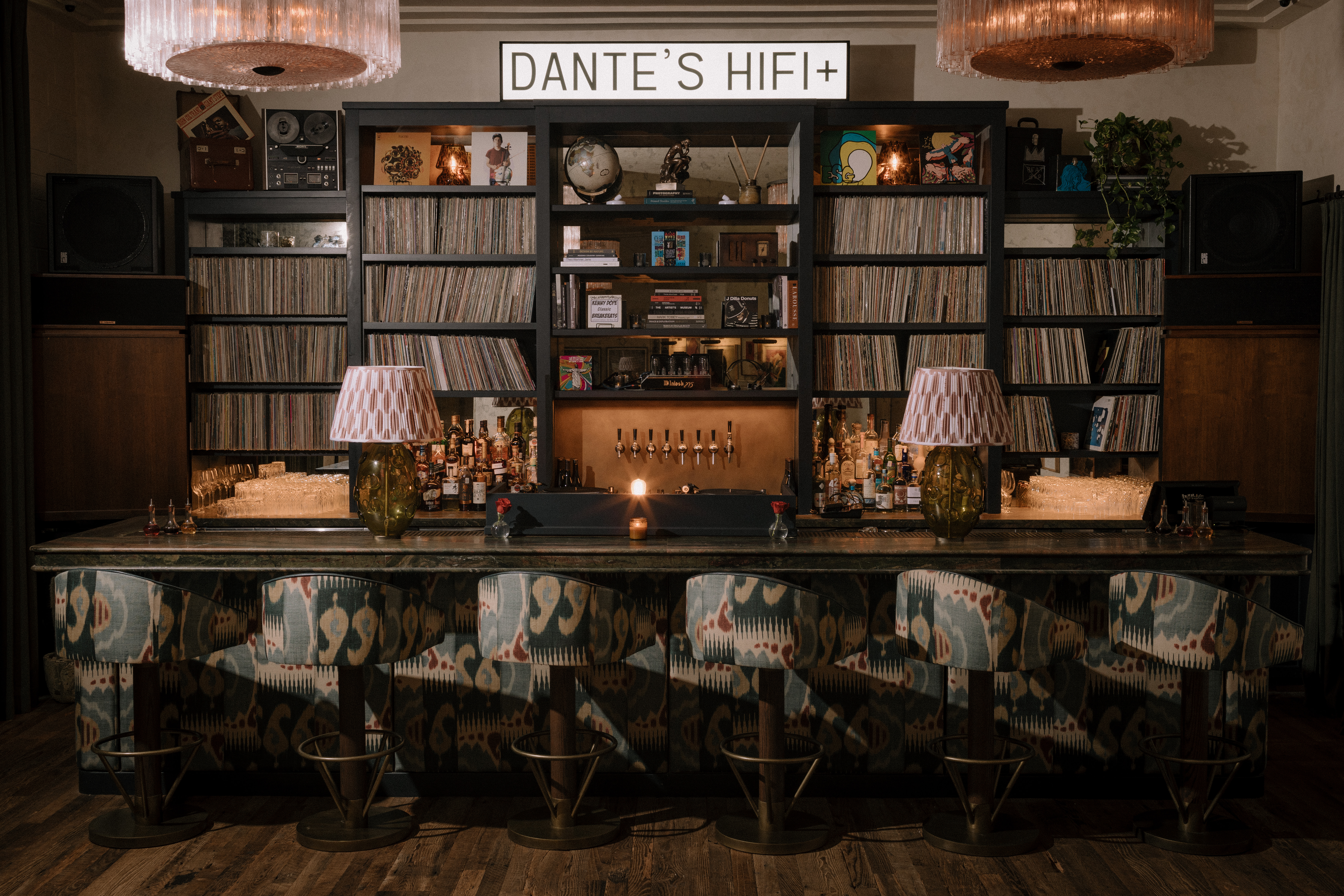 A bar with shelves of records.