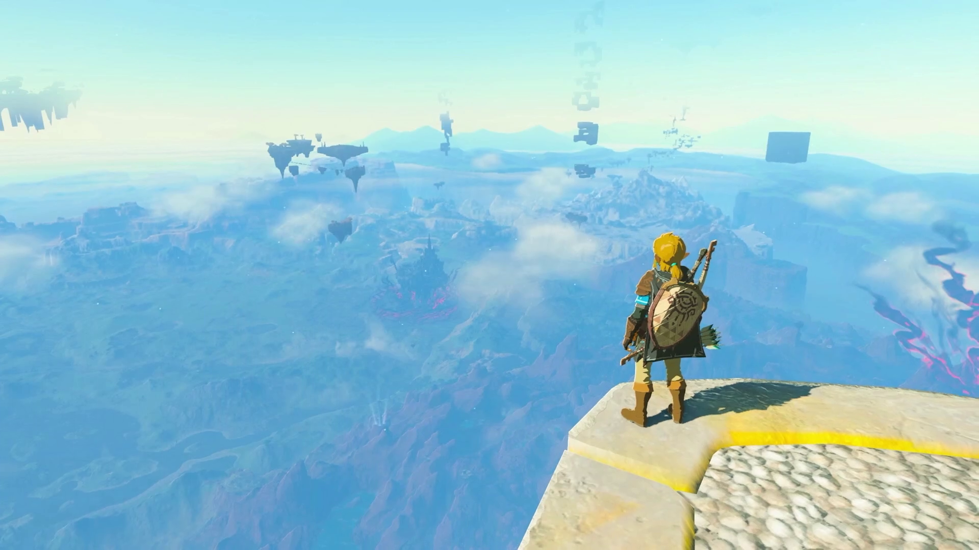 Link overlooking Hyrule from a very high tower.