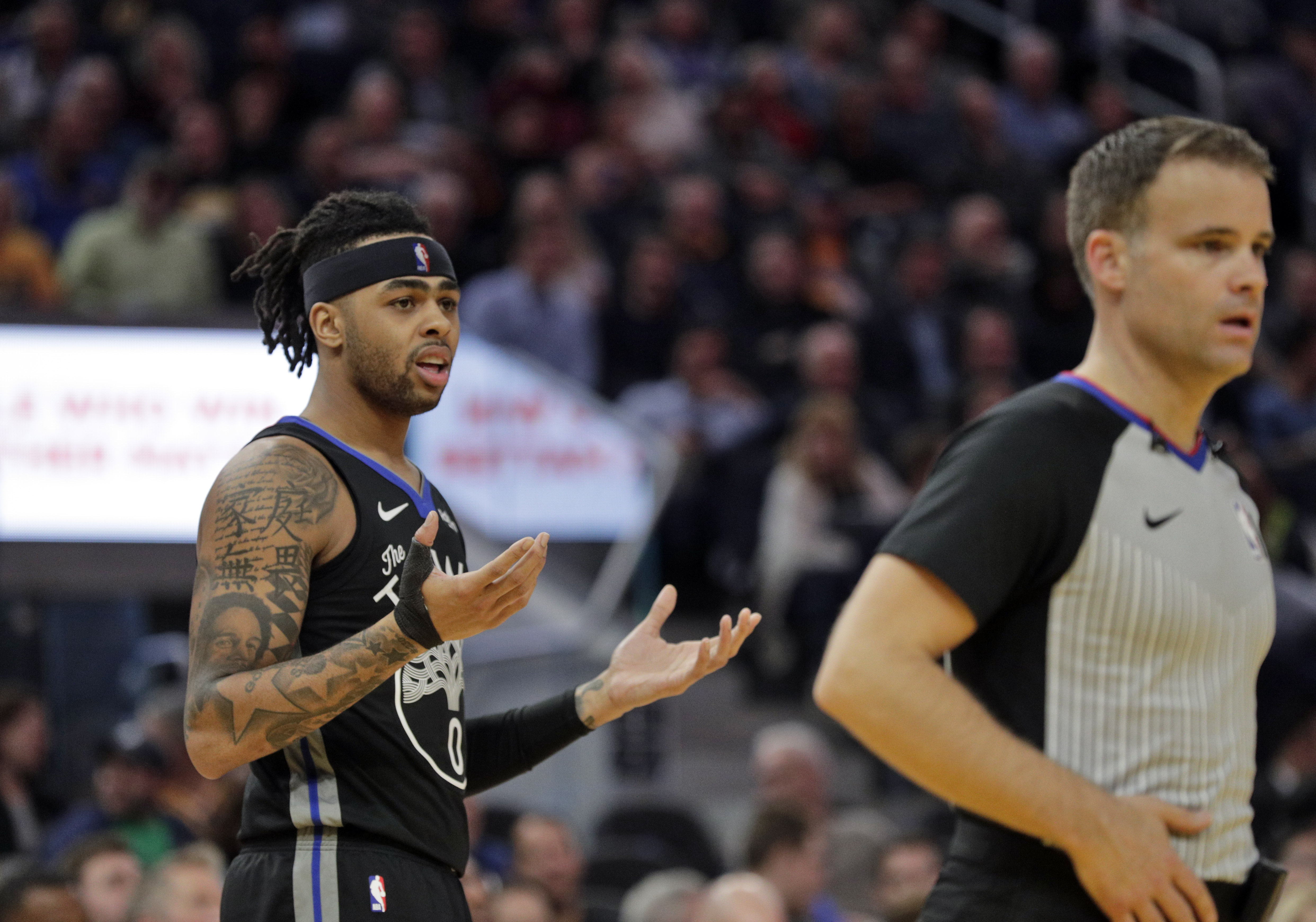 D’Angelo Russell (0) reacts to a foul call against him in the second half as the Golden State Warriors played the Dallas Mavericks at Chase Center in San Francisco, Calif., on Tuesday, January 14, 2020
