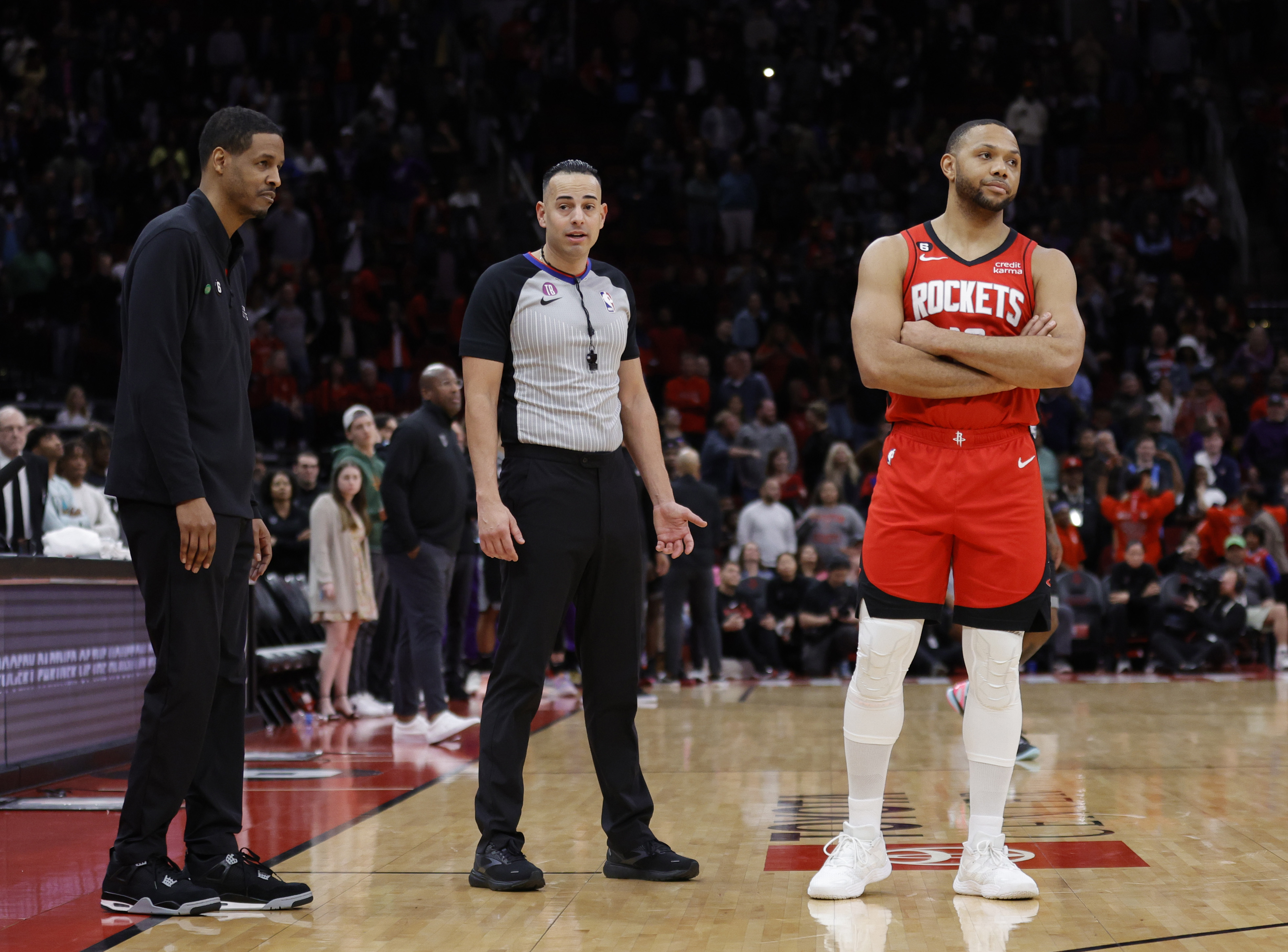 Eric Gordon of the Houston Rockets waits in the final seconds of the game alongside Head Coach Stephen Silas during the second half against the Sacramento Kings at Toyota Center on February 08, 2023 in Houston, Texas.&nbsp;
