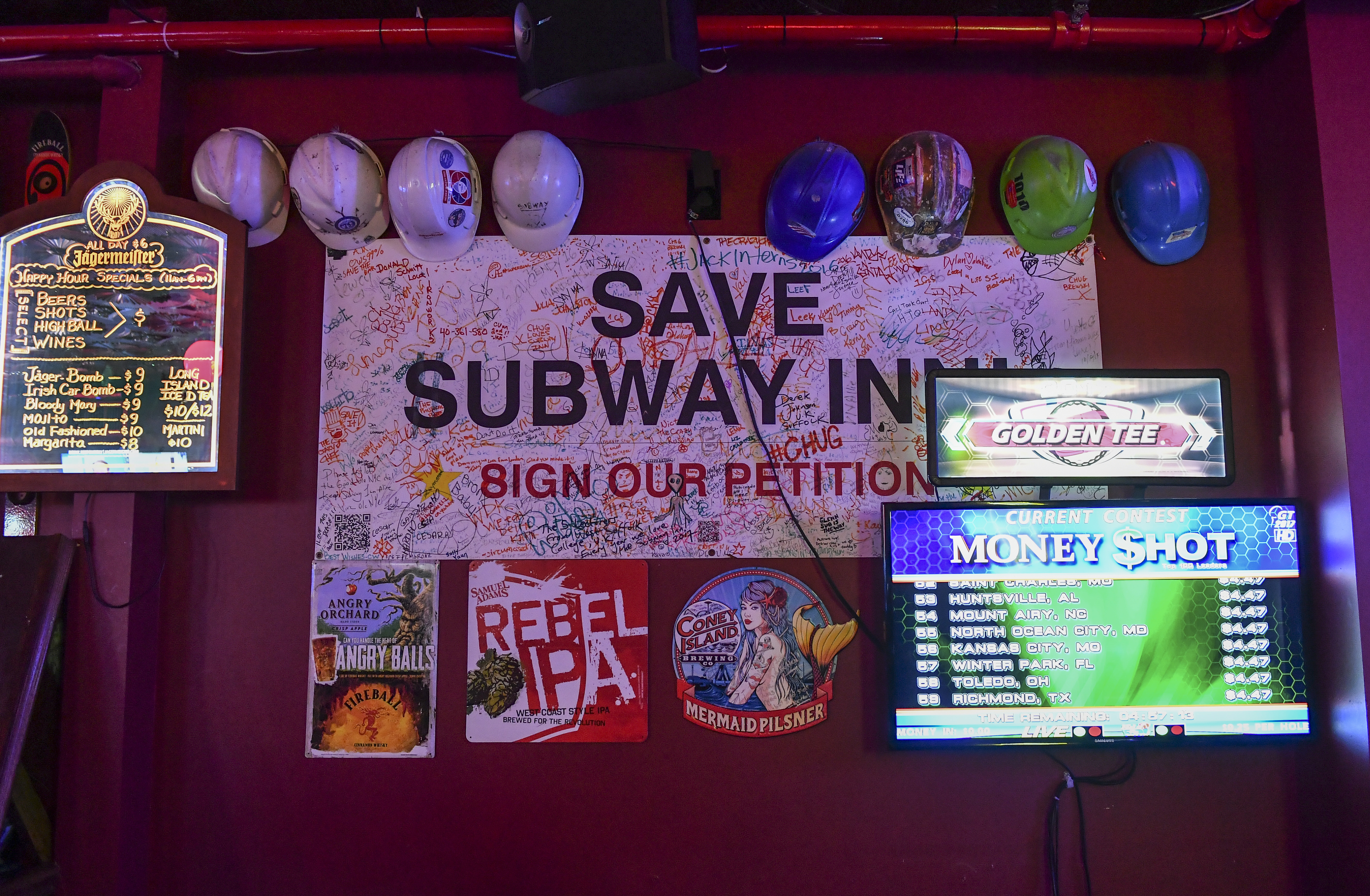 A collection of signs to save Subway Inn back in 2014. 