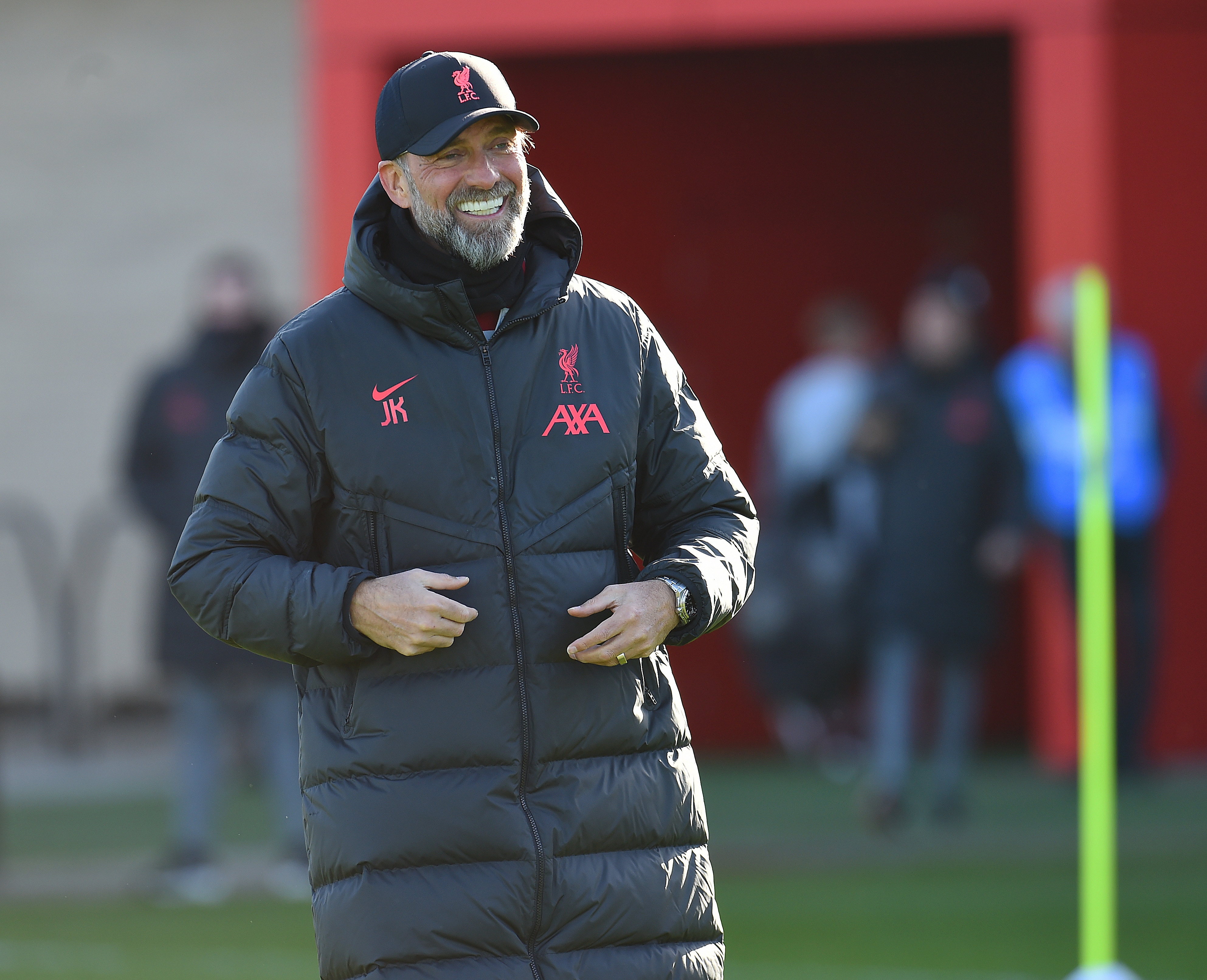 Jürgen Klopp, manager of Liverpool, smiling during a training session at AXA Training Centre on February 09, 2023 in Kirkby, England.