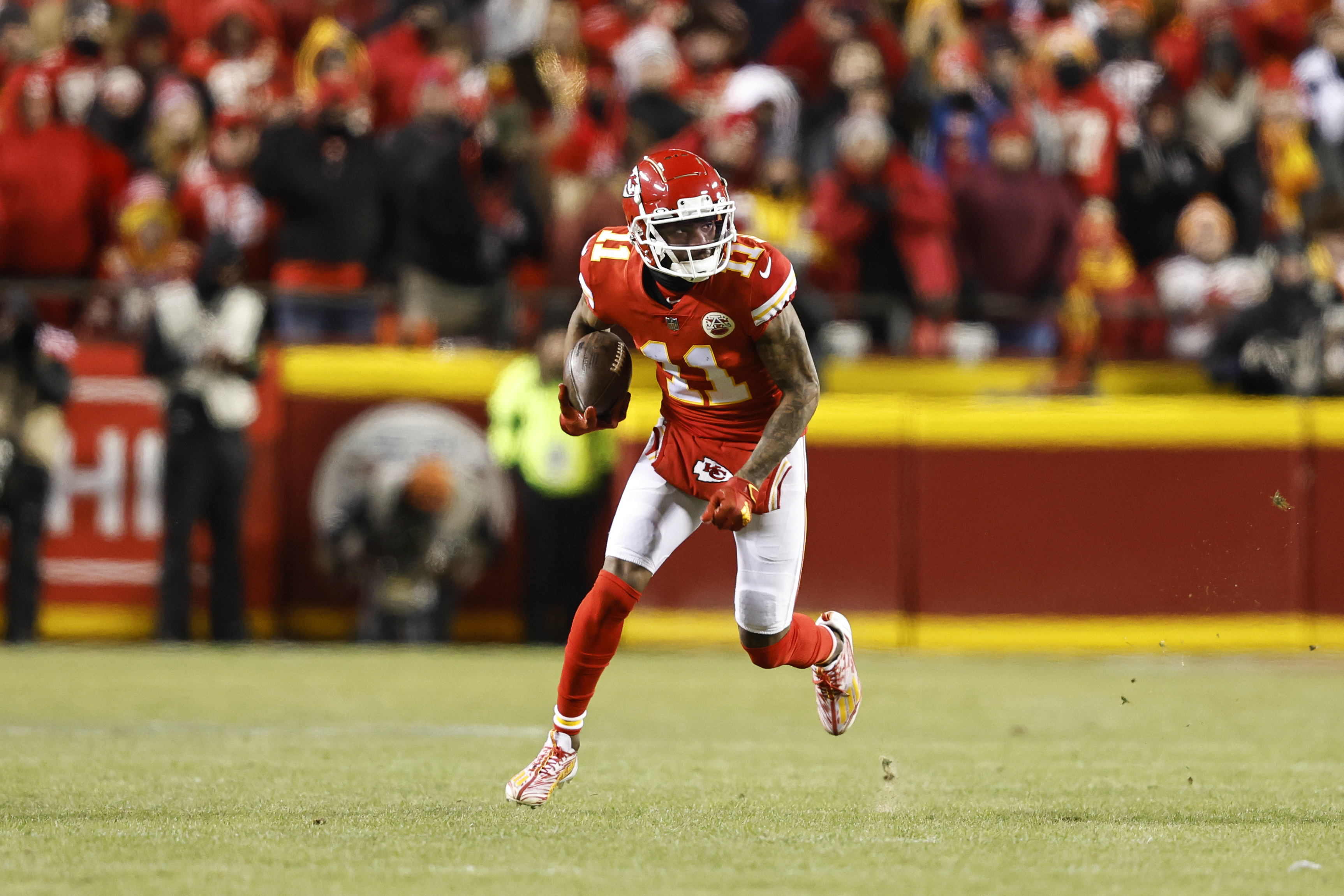 Marquez Valdes-Scantling #11 of the Kansas City Chiefs runs with the ball during the AFC Championship NFL football game between the Kansas City Chiefs and the Cincinnati Bengals at GEHA Field at Arrowhead Stadium on January 29, 2023 in Kansas City, Missouri.