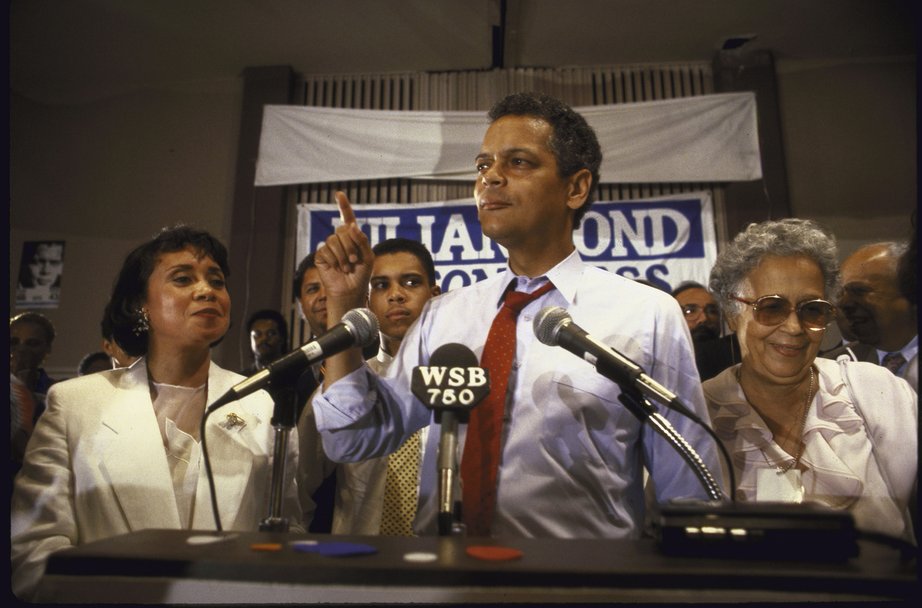 Congressional candidate Julian Bond flanked by his wife