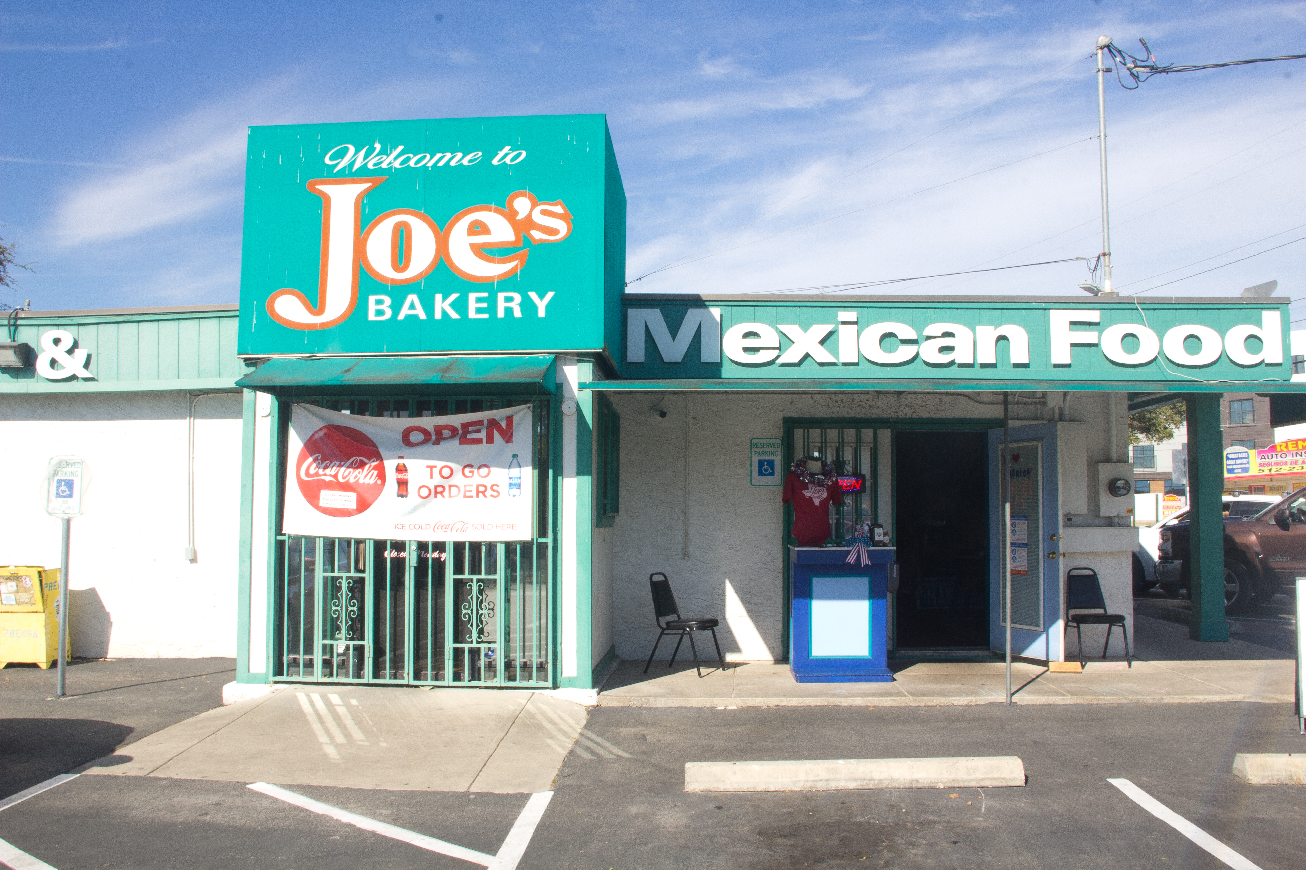 A restaurant with a sign reading Joe’s Bakery.