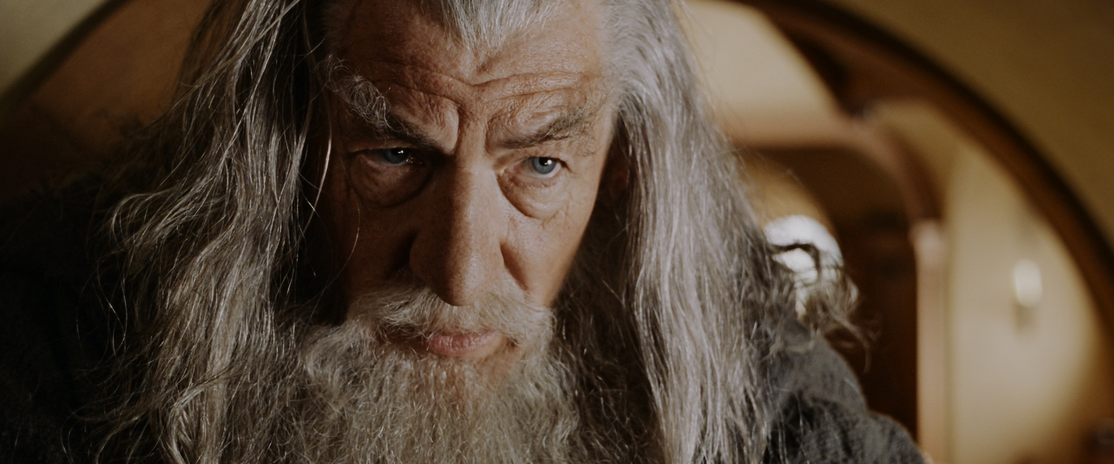 Gandalf in close up in Bilbo’s house in the shire in Fellowship of the Ring Lord of the Rings