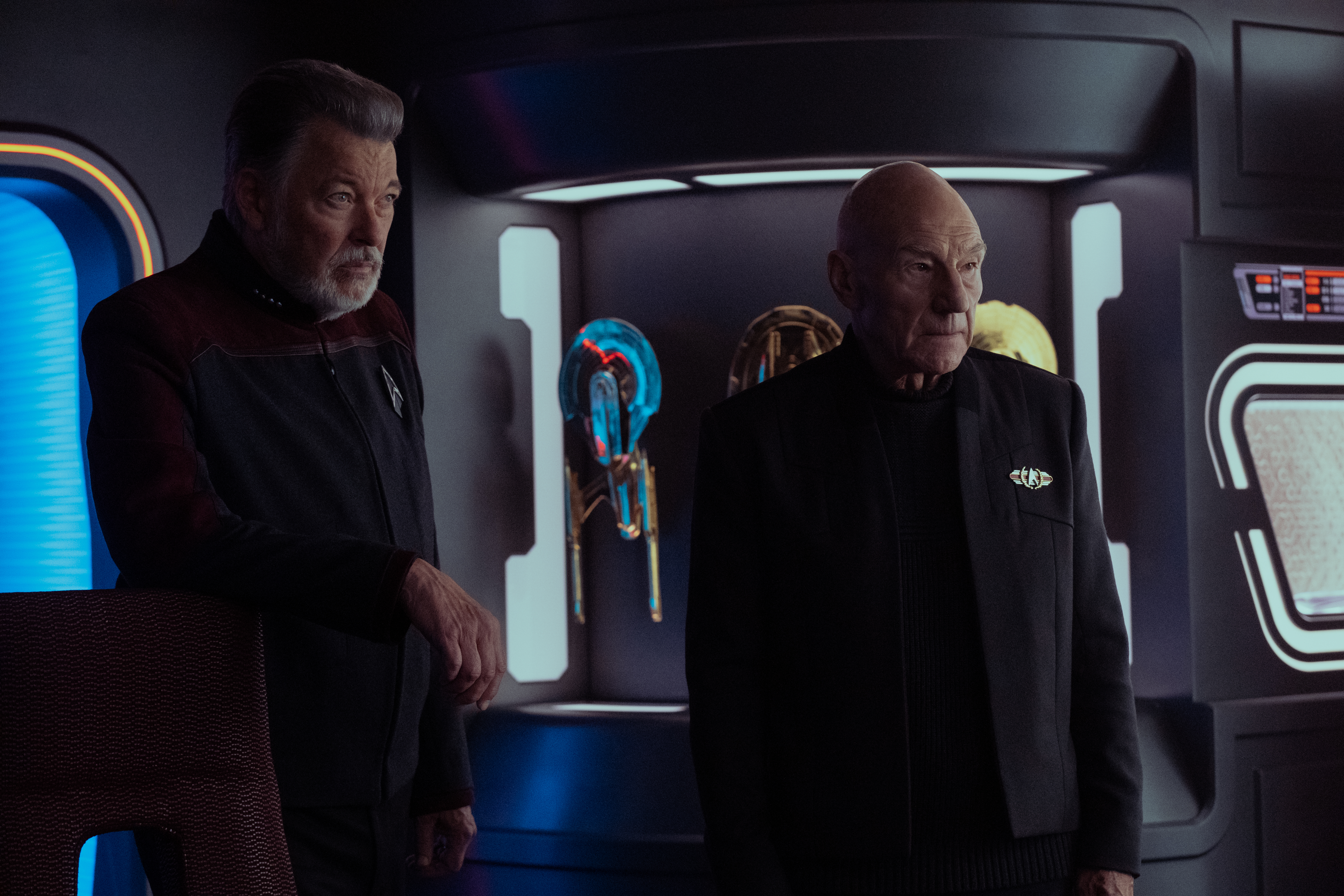 Riker (Jonathan Frakes) and Picard (Patrick Stewart) stand and look at something