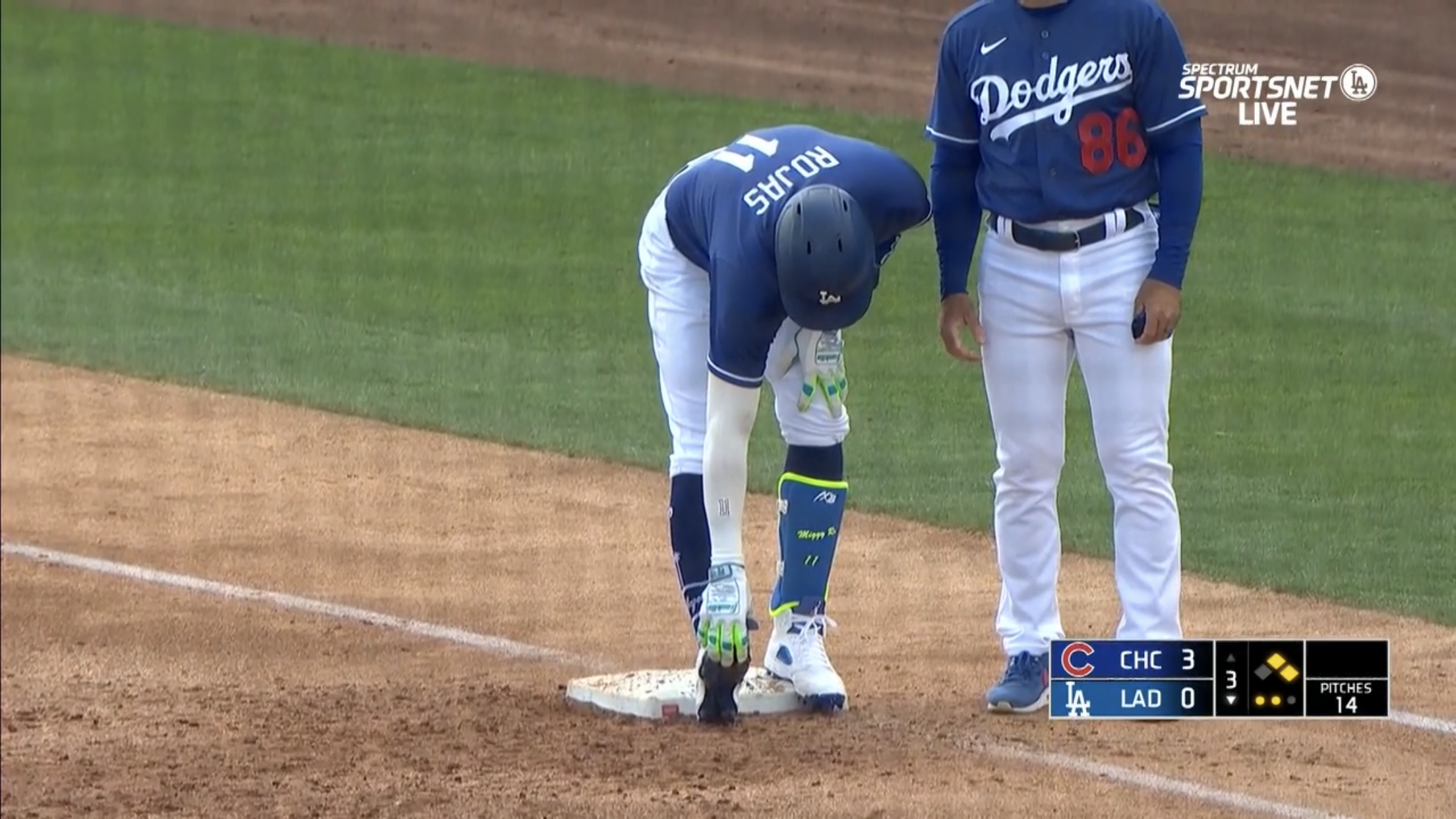 Miguel Rojas left Sunday’s Dodgers-Cubs game with a cramp in his right foot after hitting a single in the third inning at Camelback Ranch.