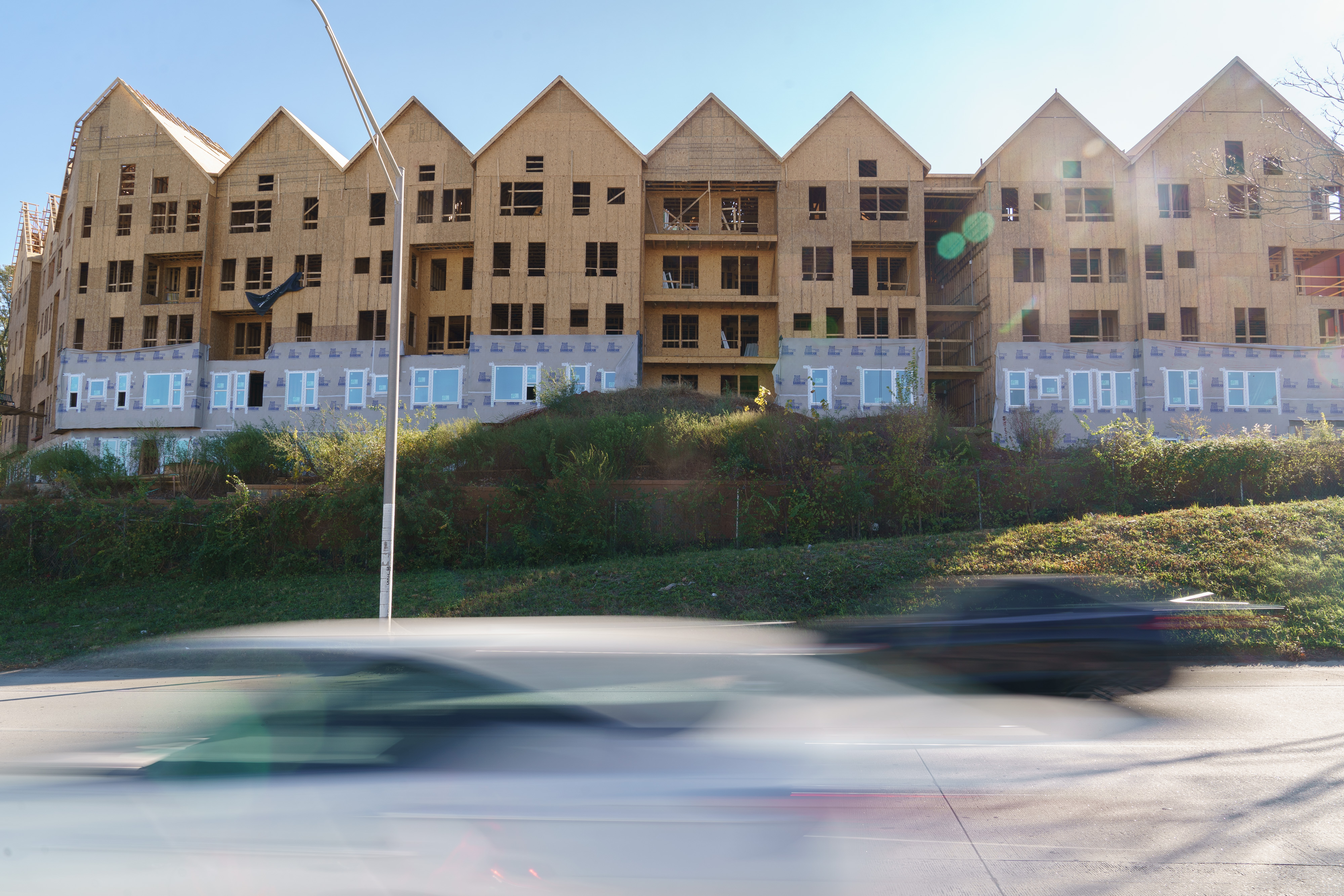 Row of multifamily houses under construction