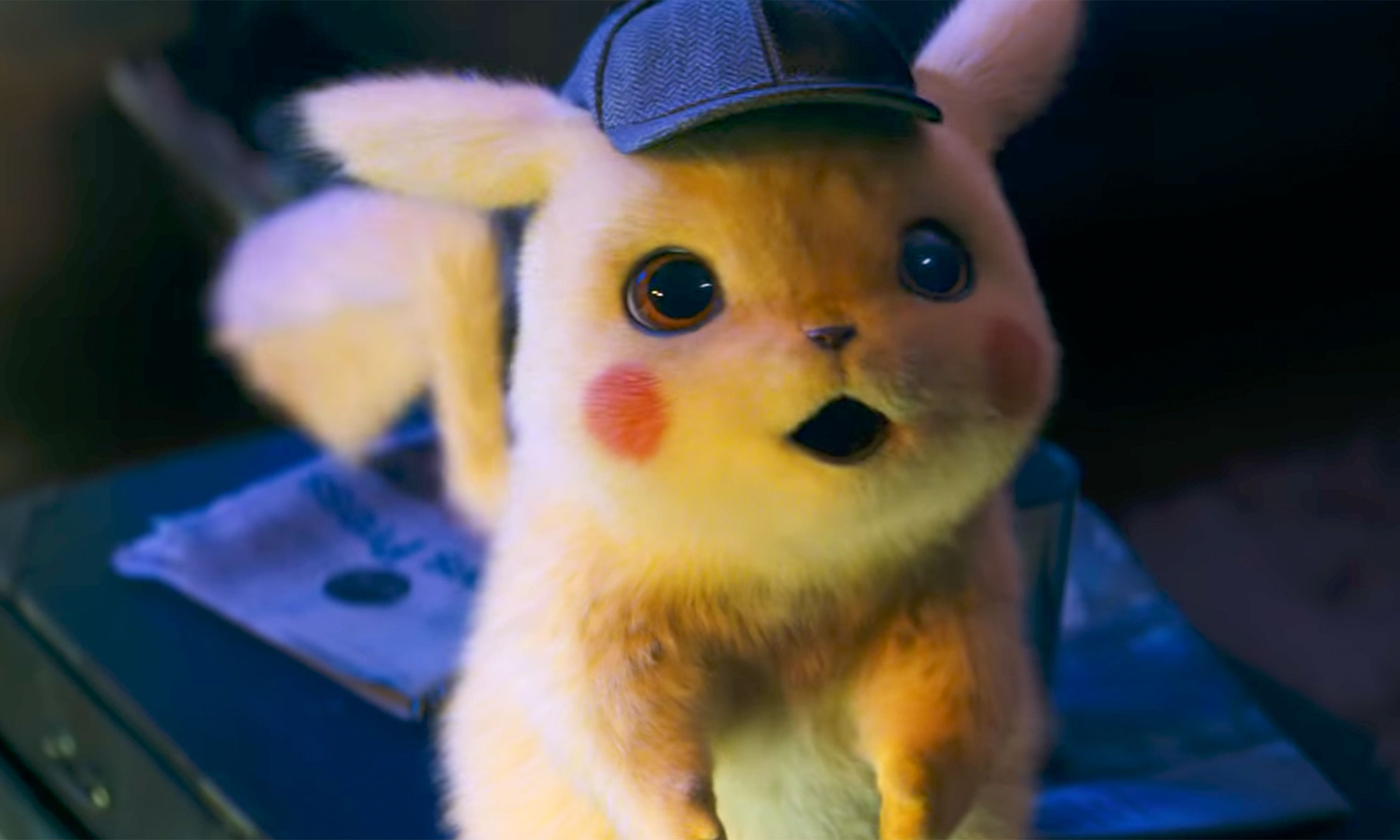 Pikachu looking up, mouth agape in Pokemon: Detective Pikachu