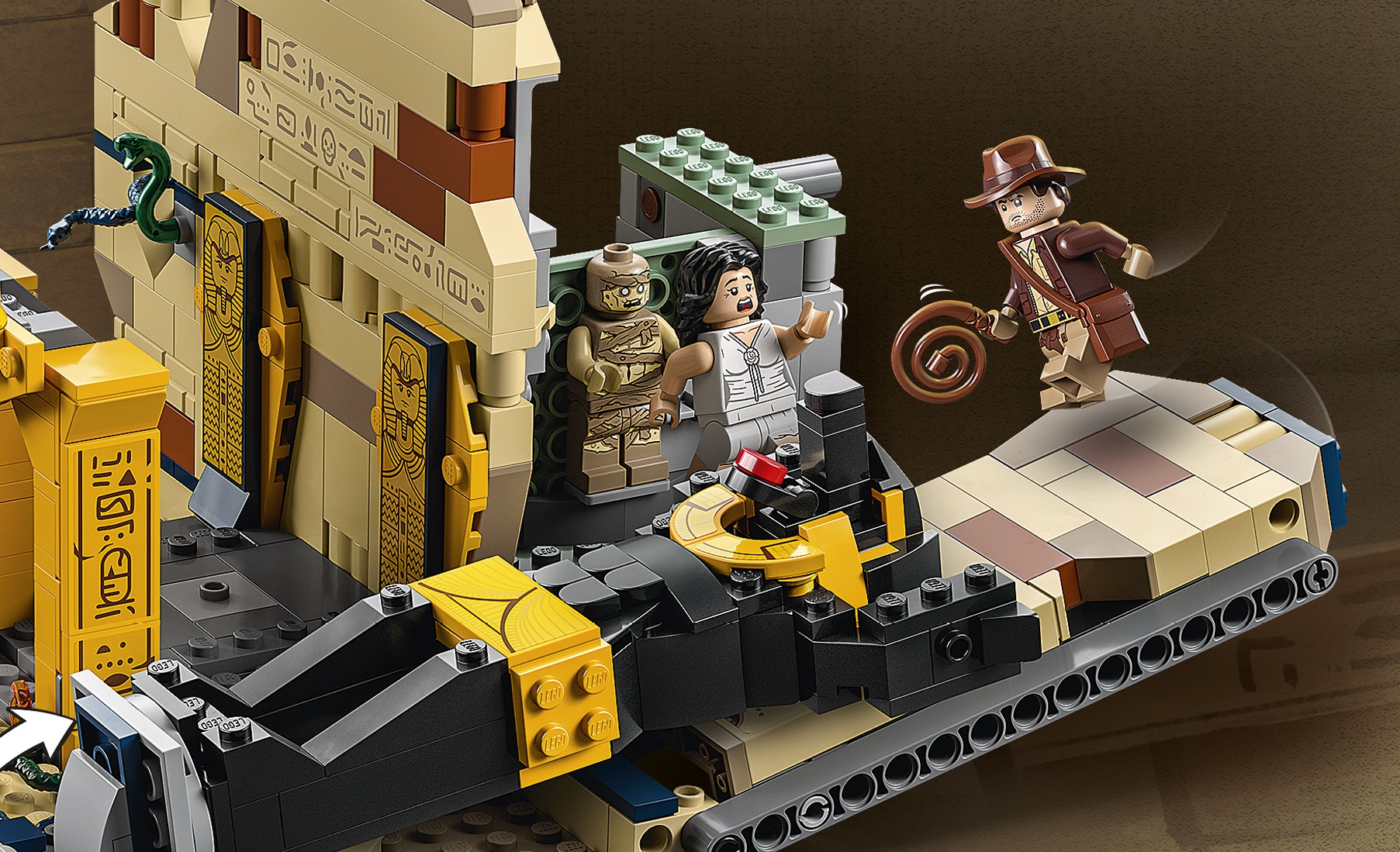 Indiana Jones Lego set close-up on box of Lego Indy jumping to save Lego Marion