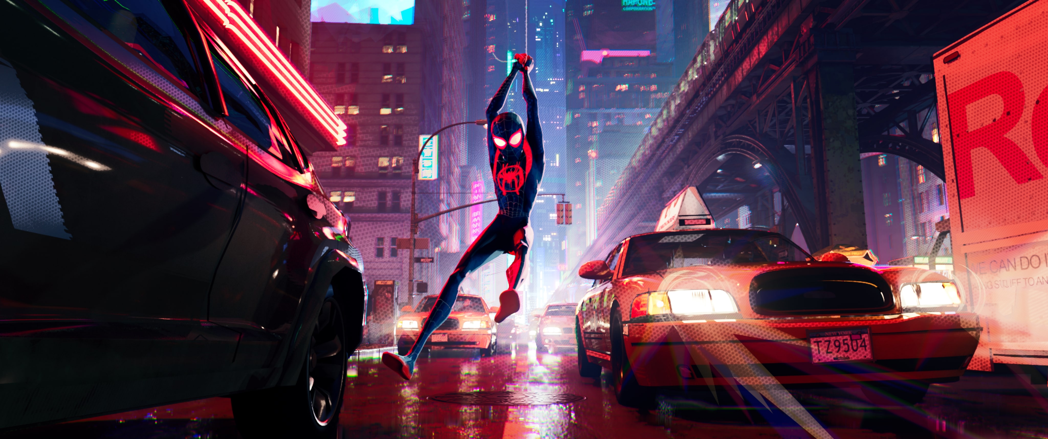 Miles Morales swings through Manhattan streets in Spider-Man: Into the Spider-Verse. 