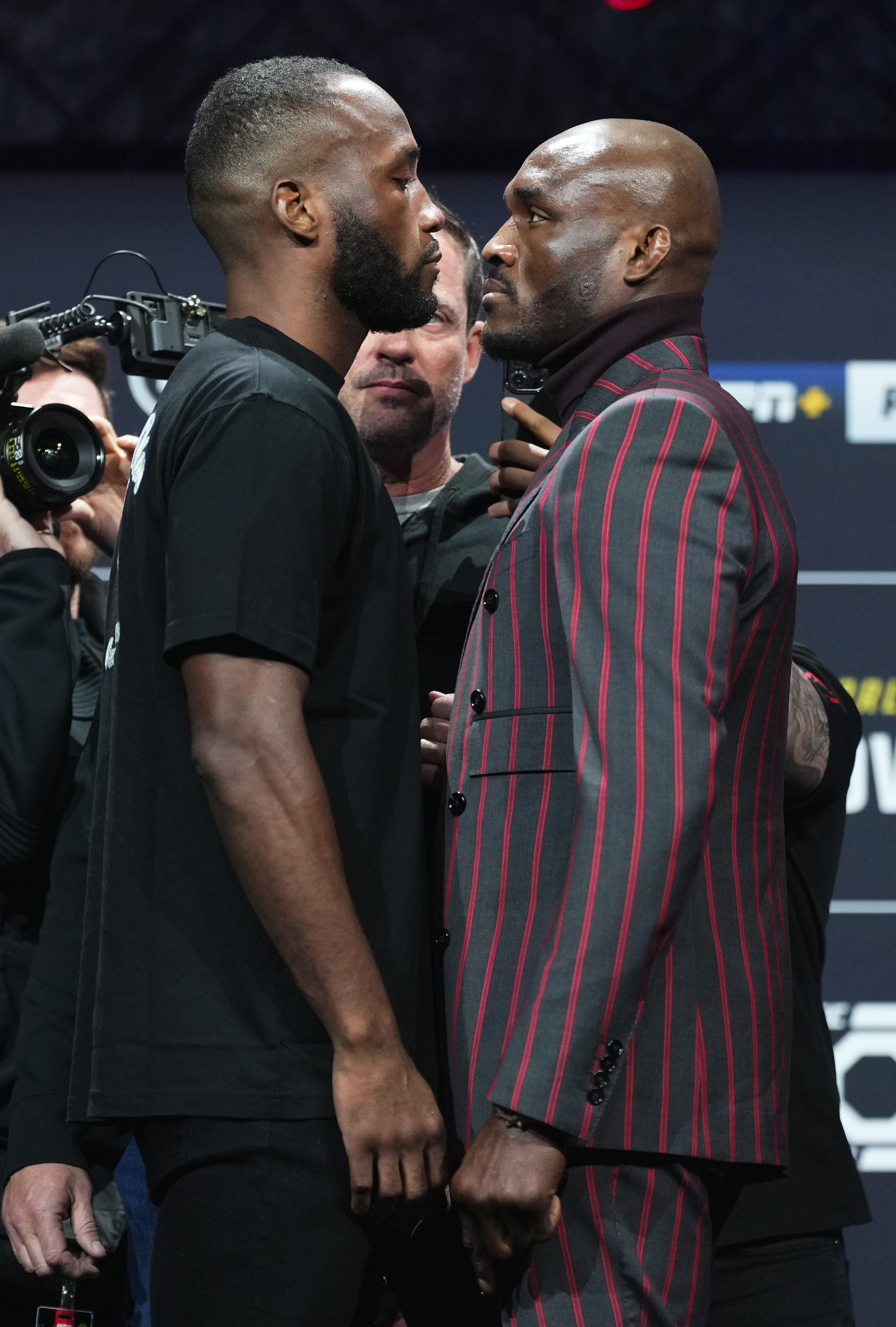 Opponents Leon Edwards of Jamaica and Kamaru Usman of Nigeria face off during the UFC 286 press conference at Magazine London on March 16, 2023 in London, England.